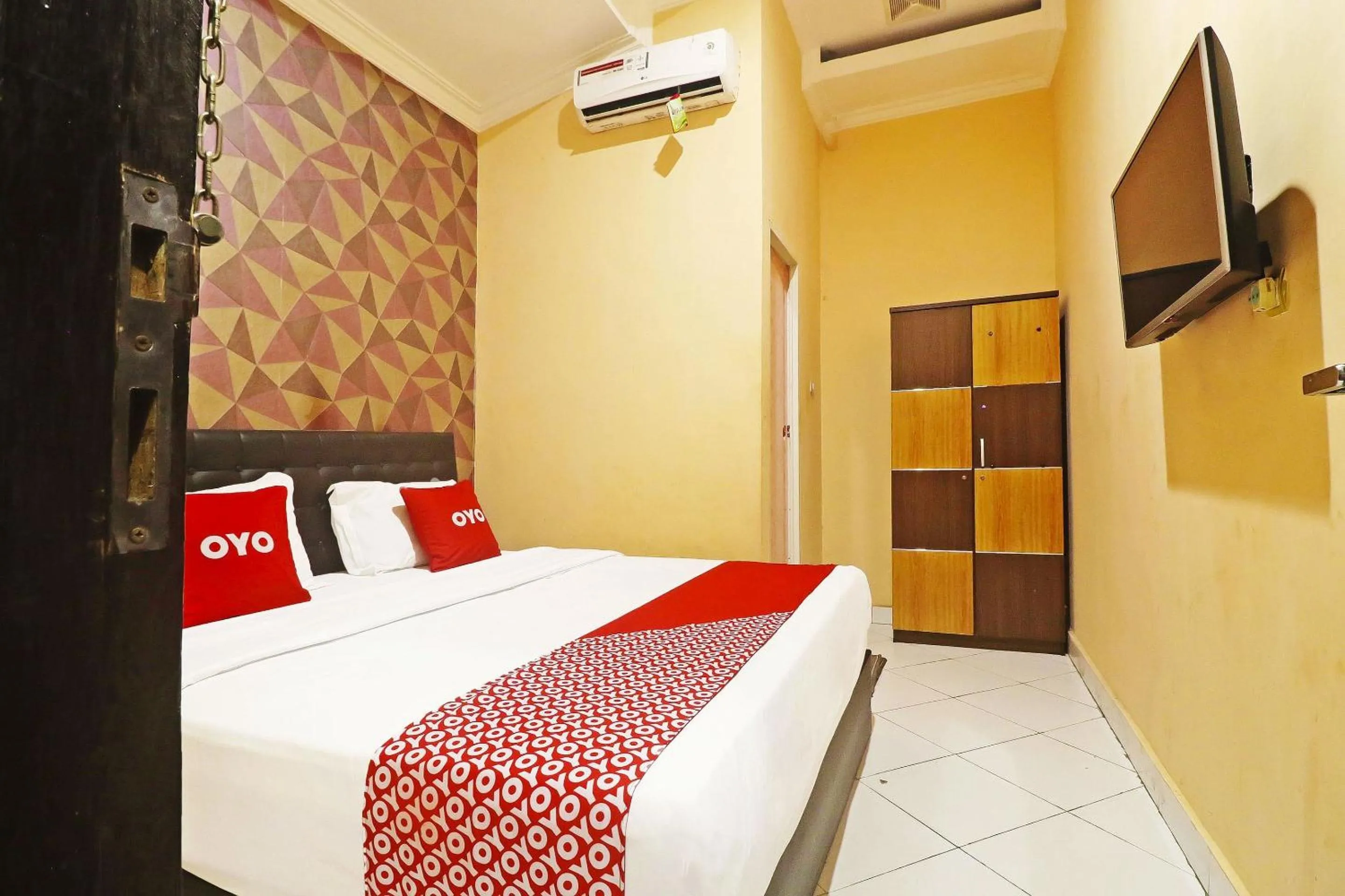 Bedroom in Hotel O Papi Inn Guesthouse