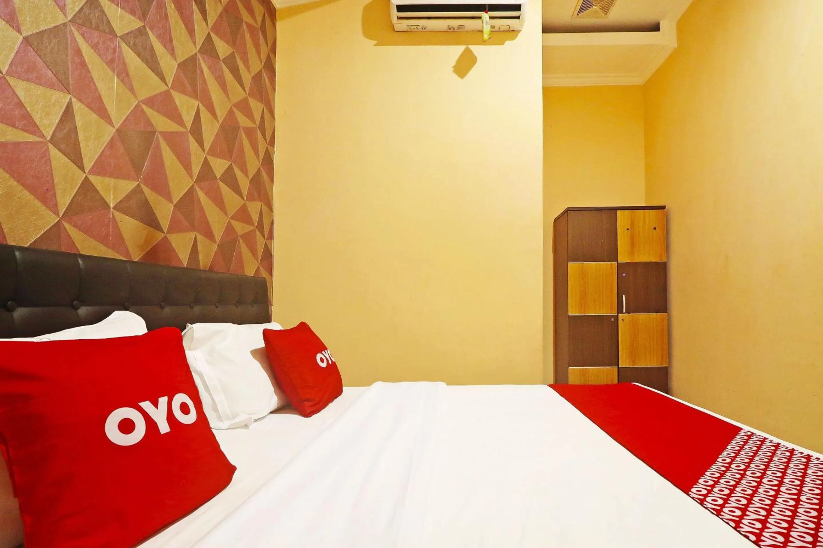 Bedroom in Hotel O Papi Inn Guesthouse