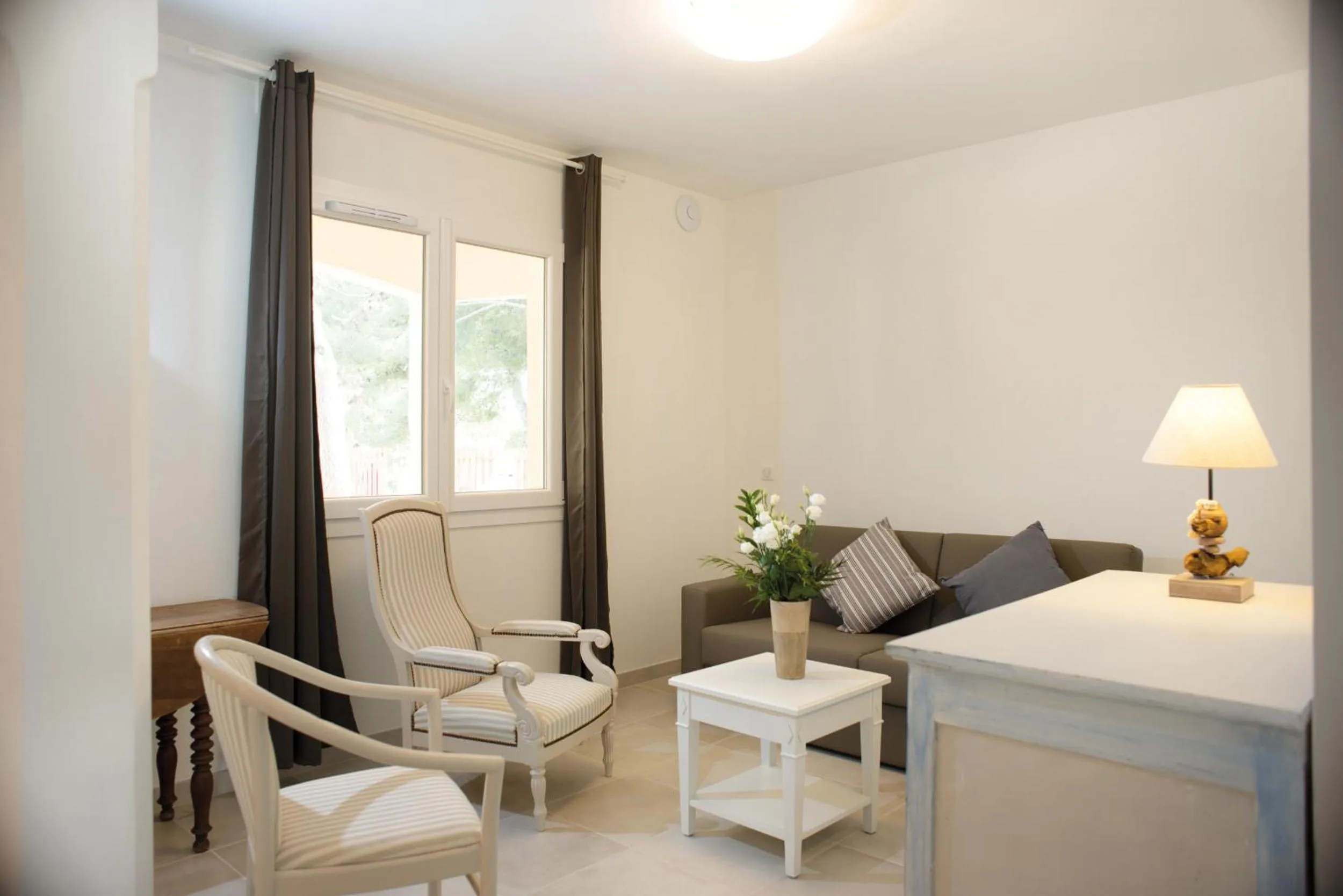 Seating area in Appartements des Joncas