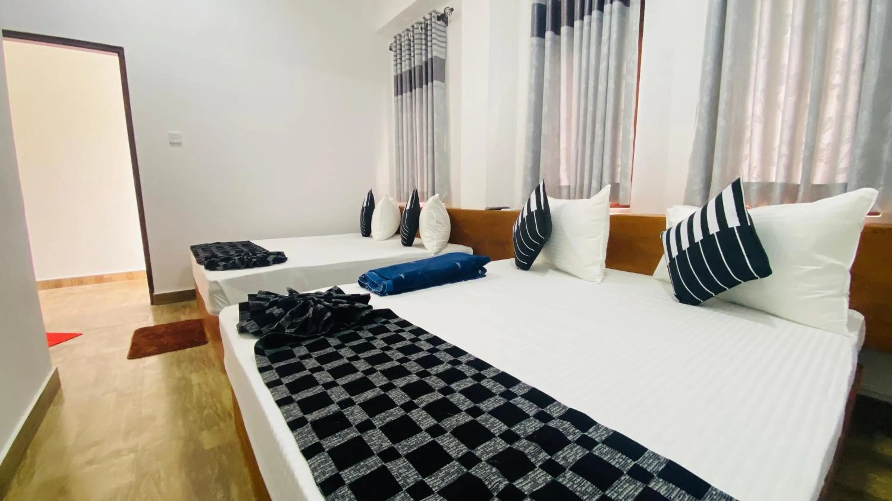 Bed in Aloft Grand Hotel Ella