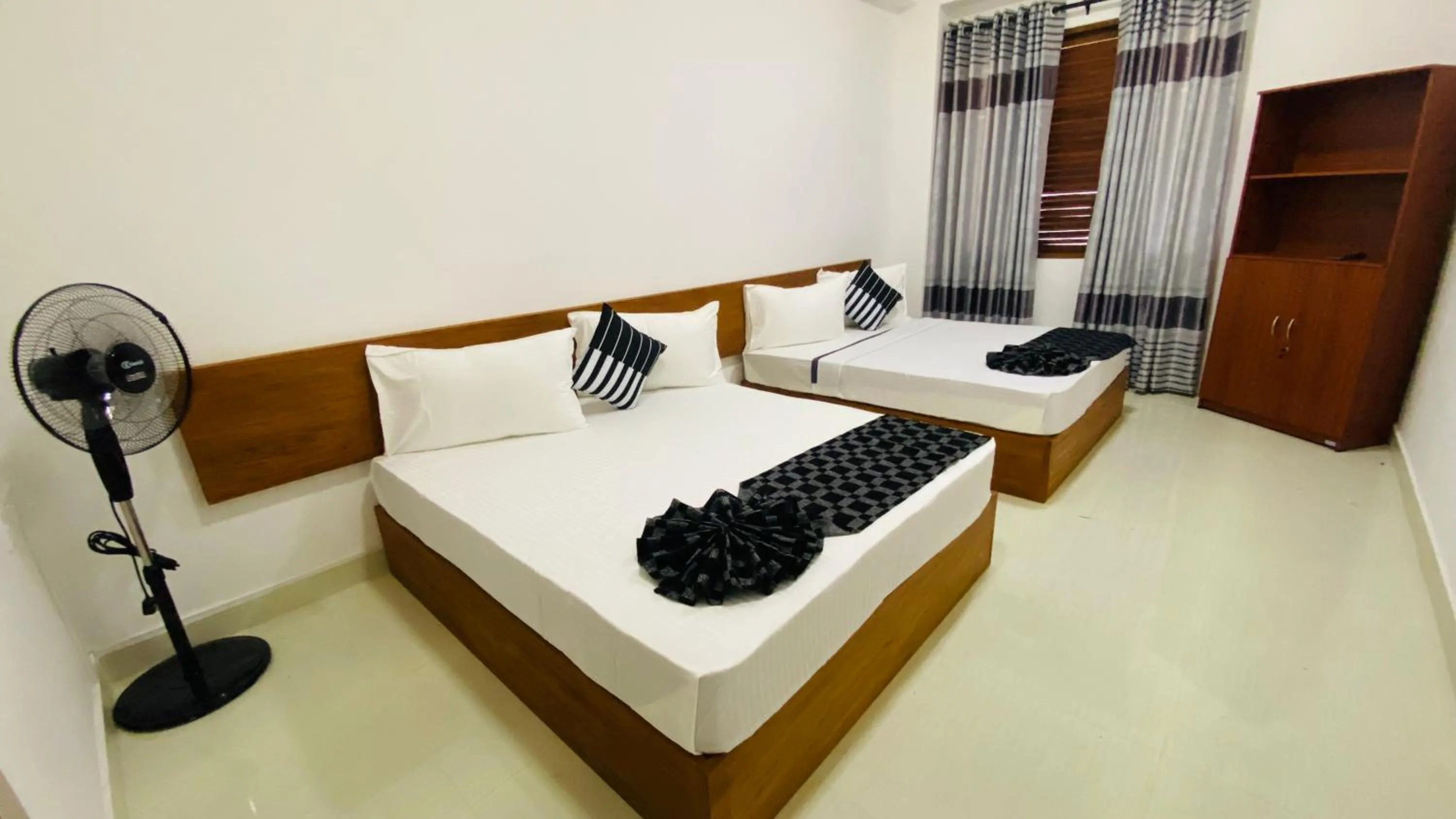 Bed in Aloft Grand Hotel Ella