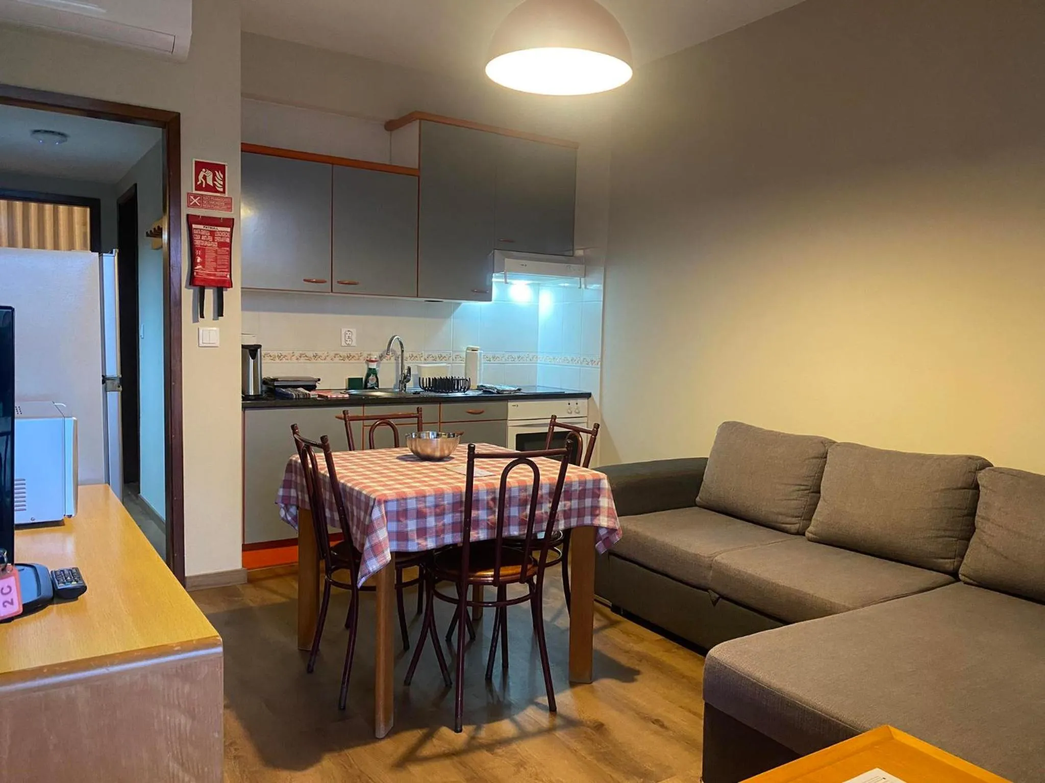 Kitchen or kitchenette in Apartamentos São João