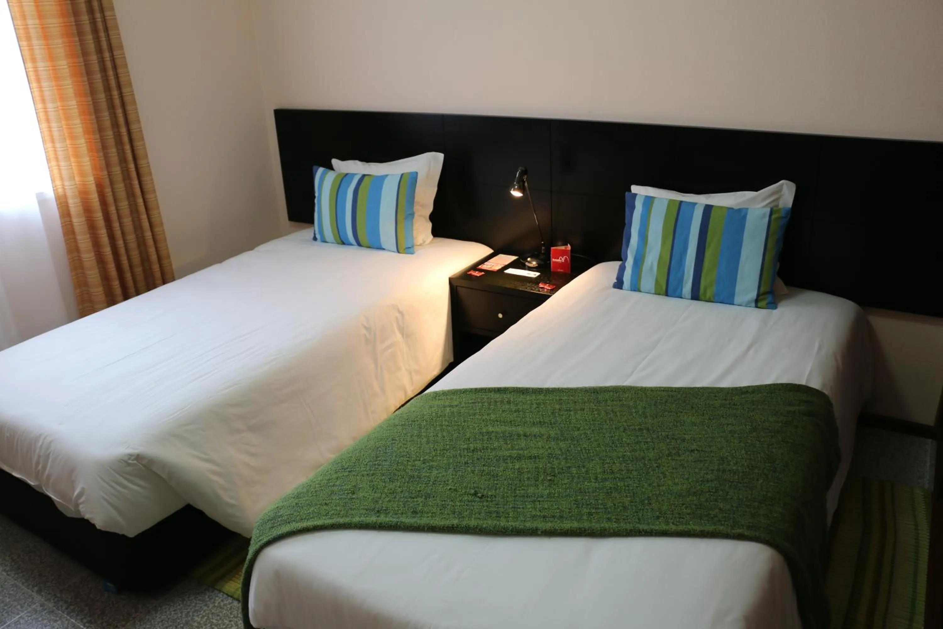 Bed in Apartamentos São João