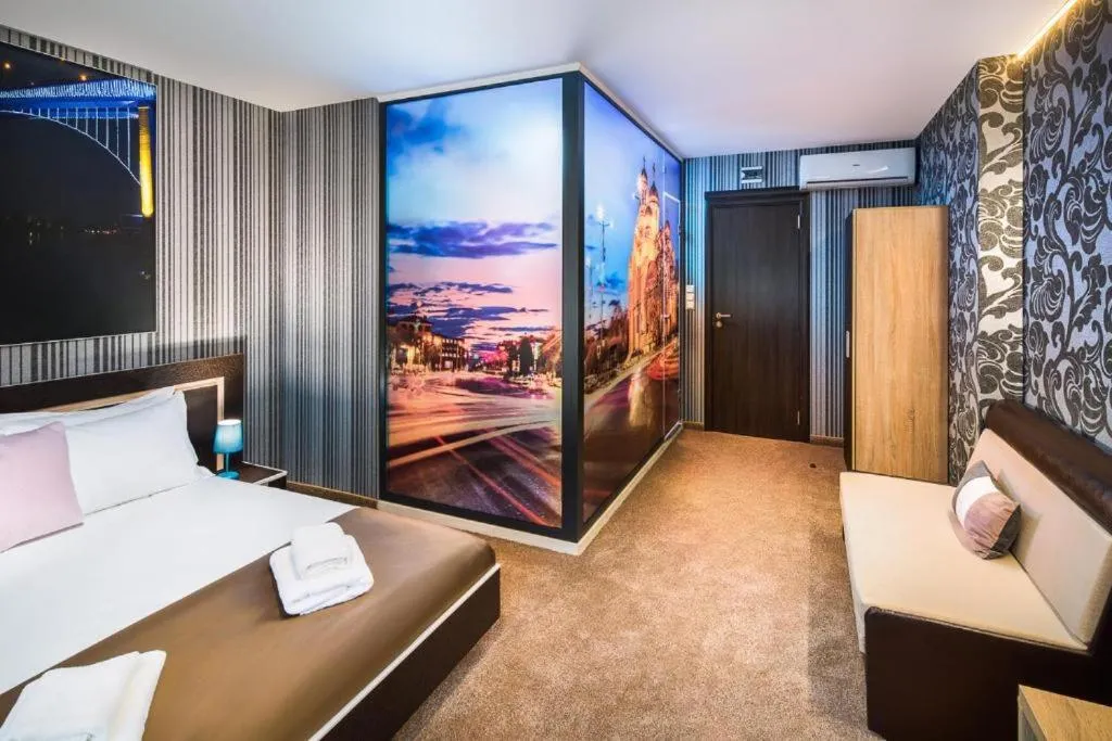 Bed in Central Point Boutique Hotel