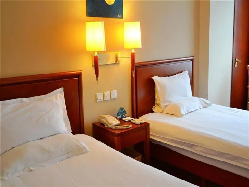 Bed in Greentree Inn Shanghai Chongming Bao Town Express Hotel
