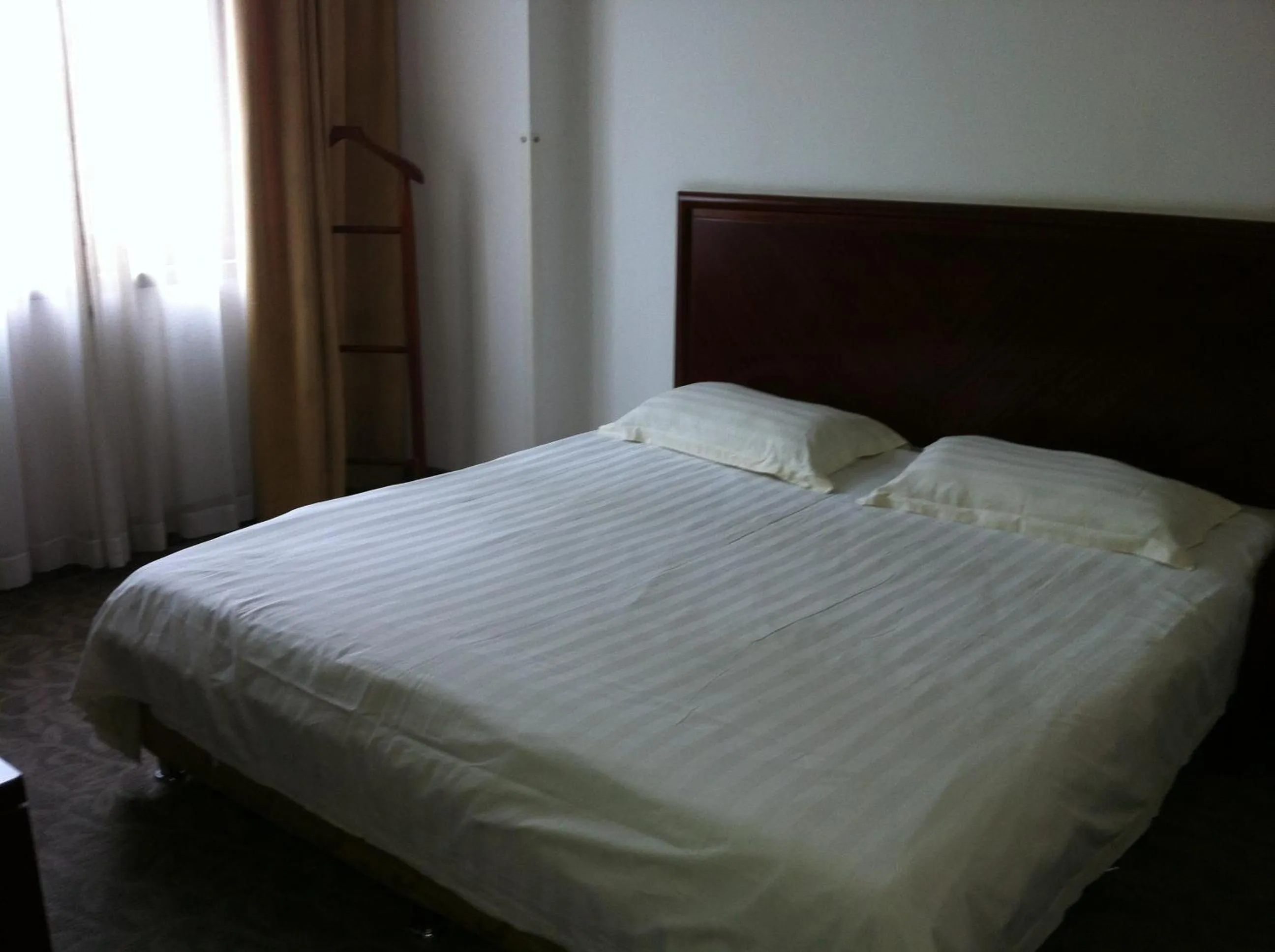 Bed in Greentree Inn Shanghai Chongming Bao Town Express Hotel