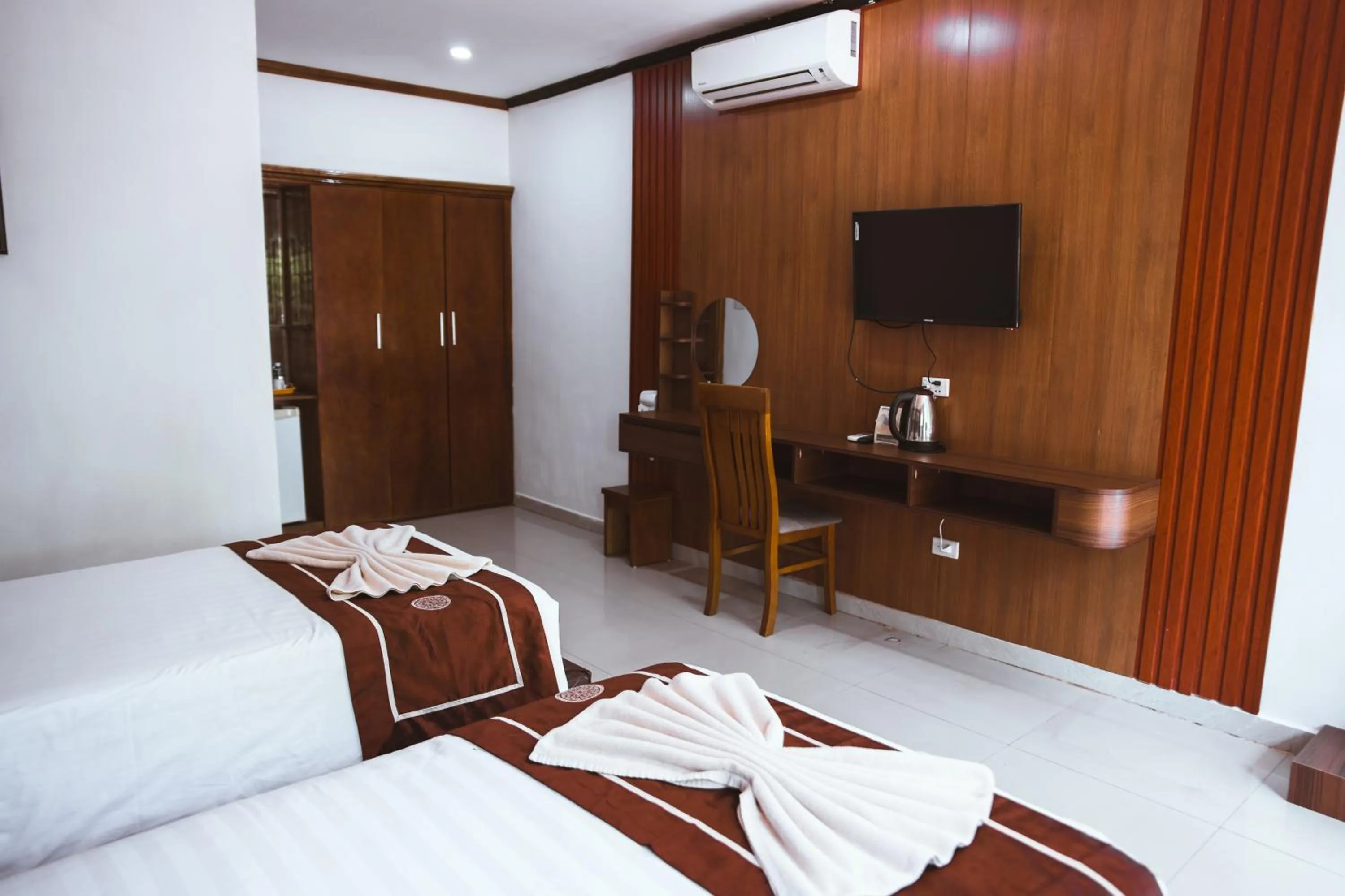 Bed in Vientiane Garden Villa Hotel