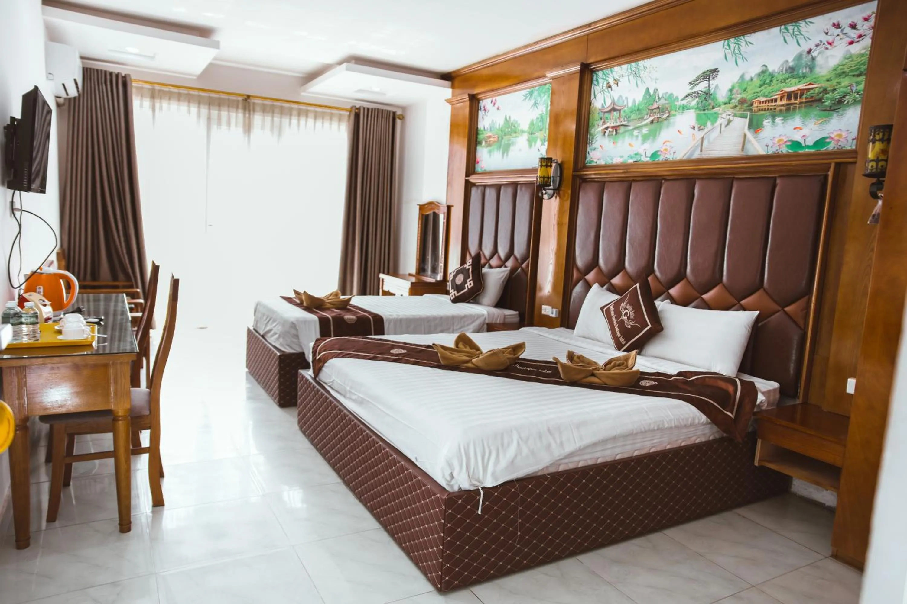 Bed in Vientiane Garden Villa Hotel