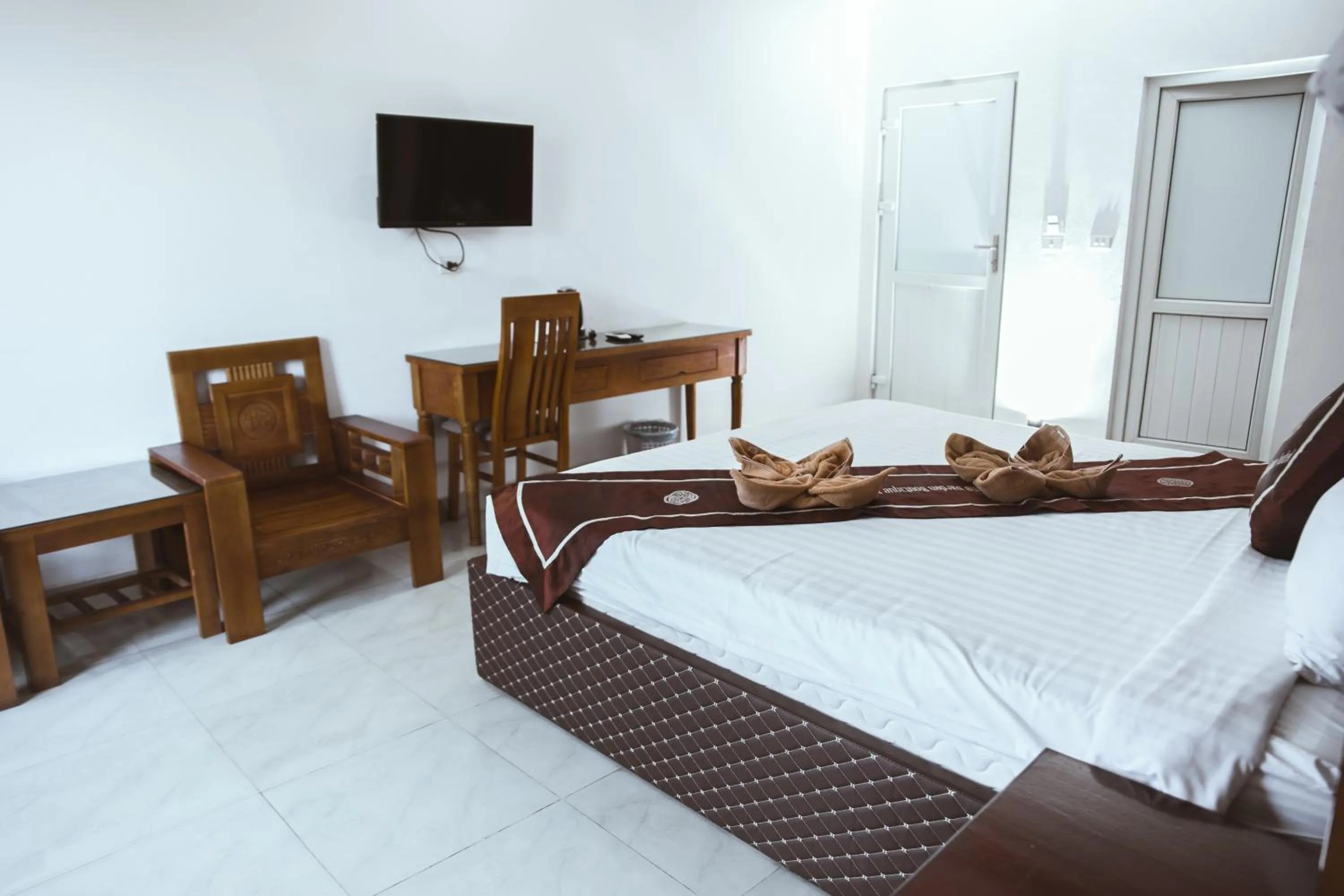 Bed in Vientiane Garden Villa Hotel