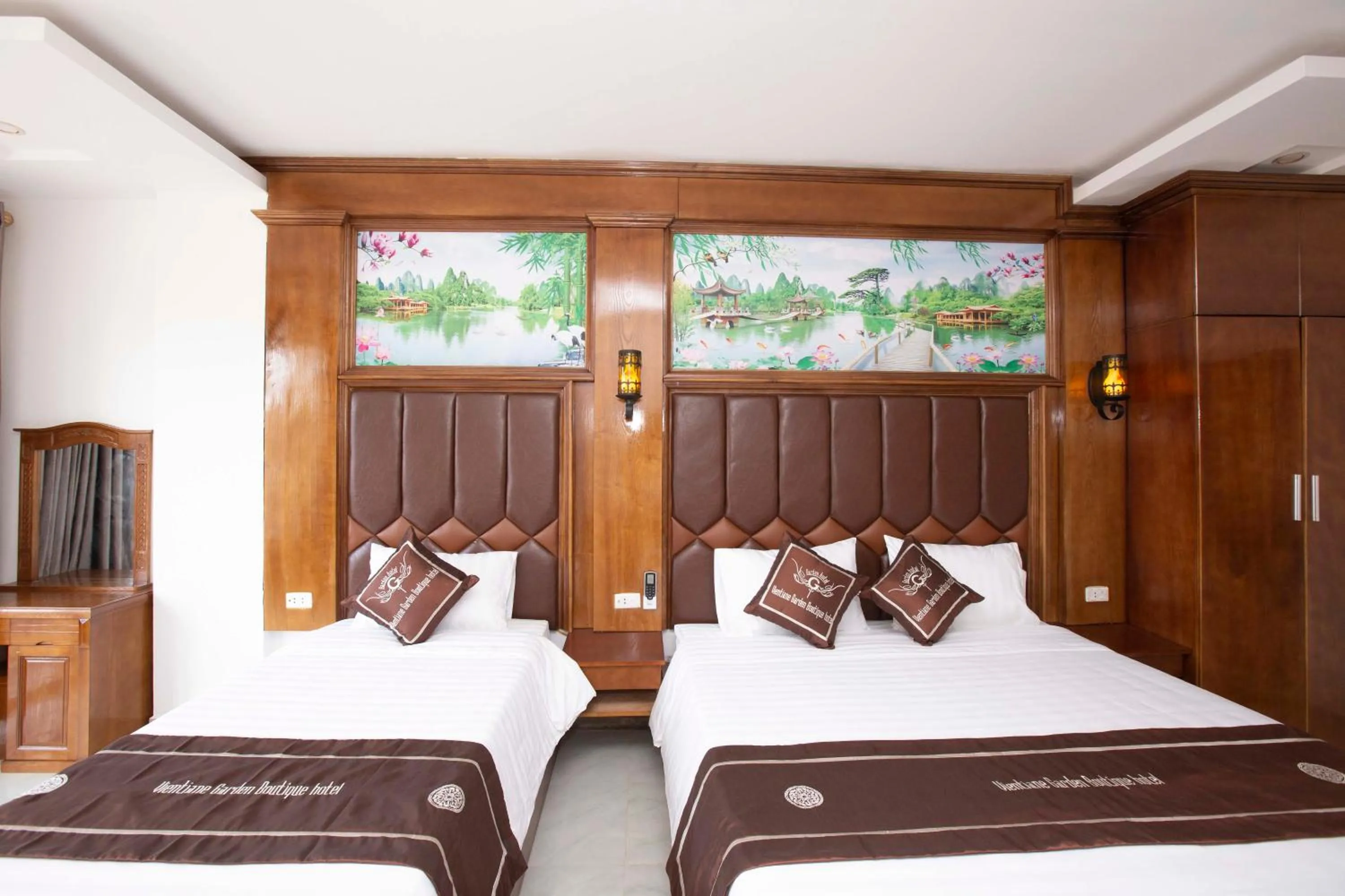 Bed in Vientiane Garden Villa Hotel