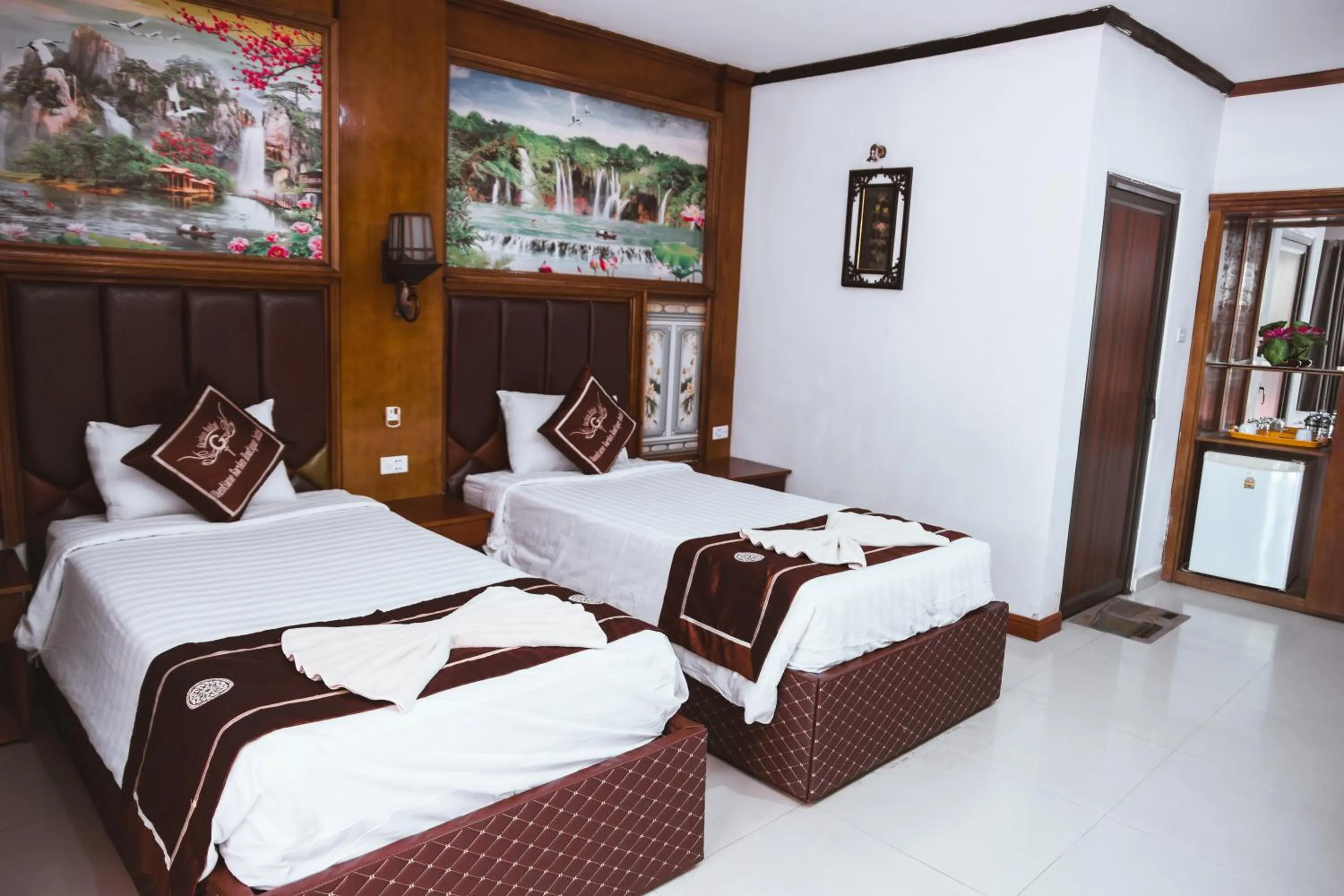 Bed in Vientiane Garden Villa Hotel