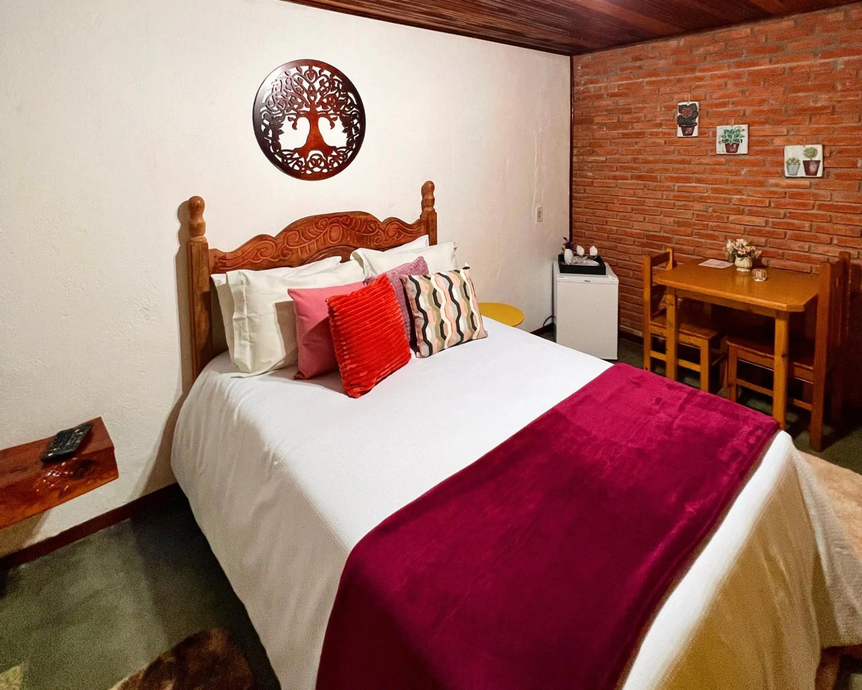 Bed in Chalés Recanto da cachoeira