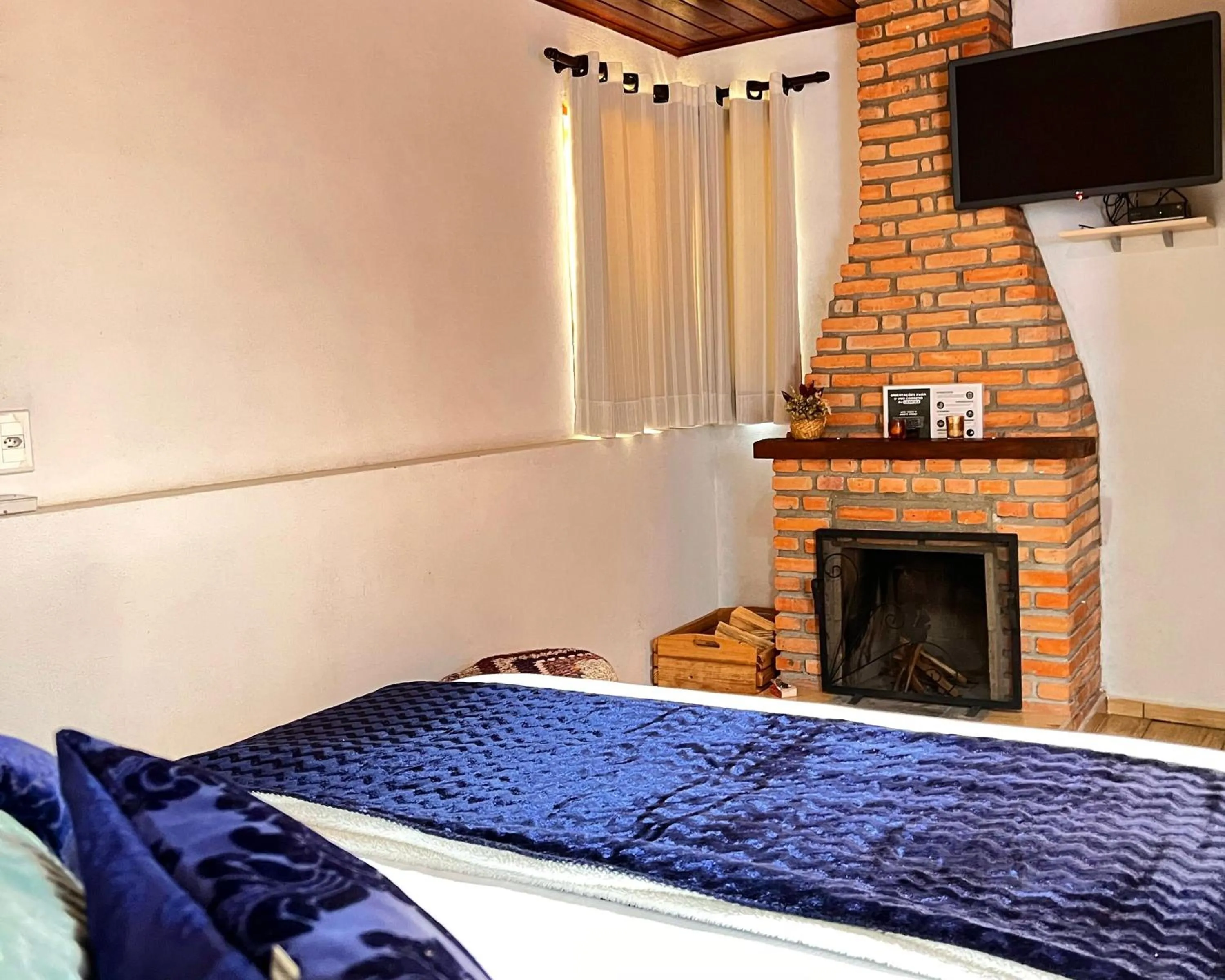 Bed in Chalés Recanto da cachoeira