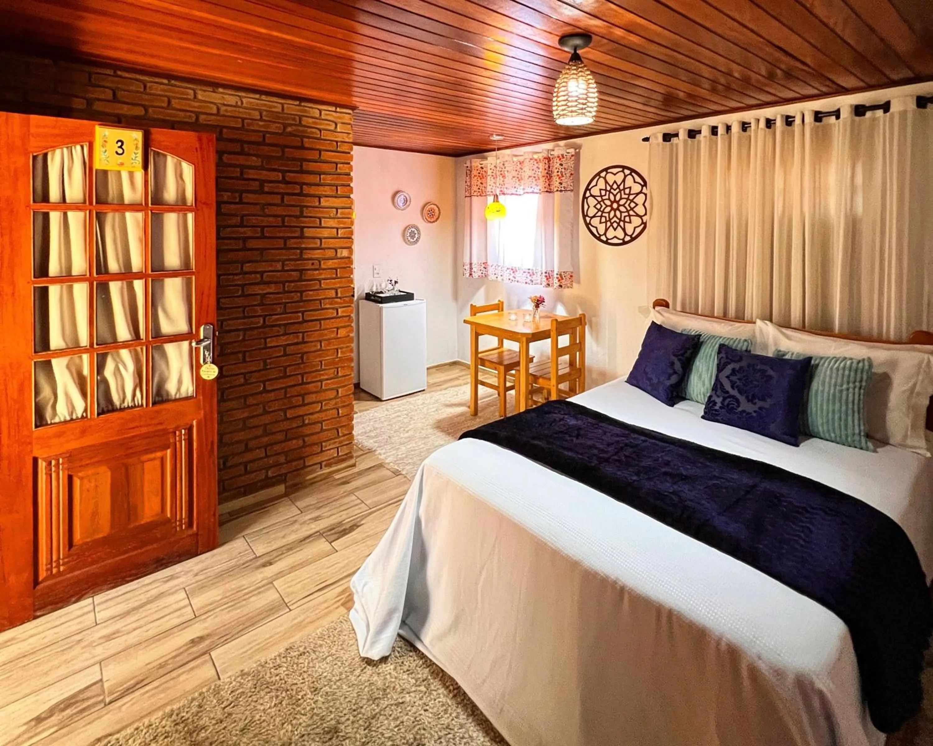 Bed in Chalés Recanto da cachoeira