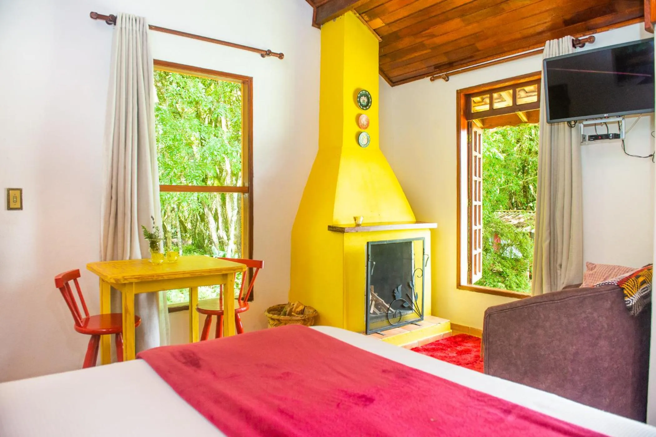 Bed in Chalés Recanto da cachoeira