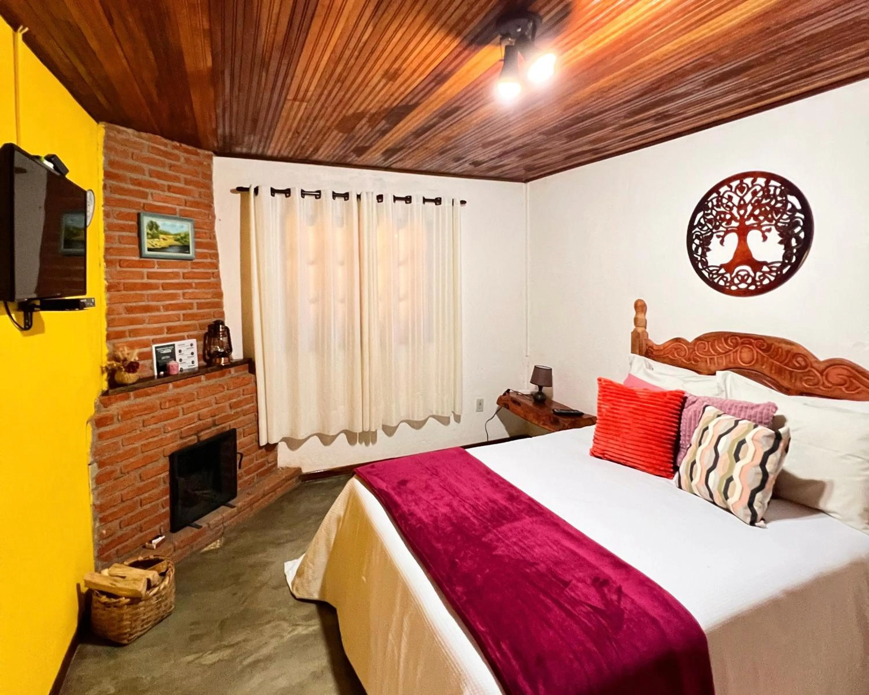 Bed in Chalés Recanto da cachoeira