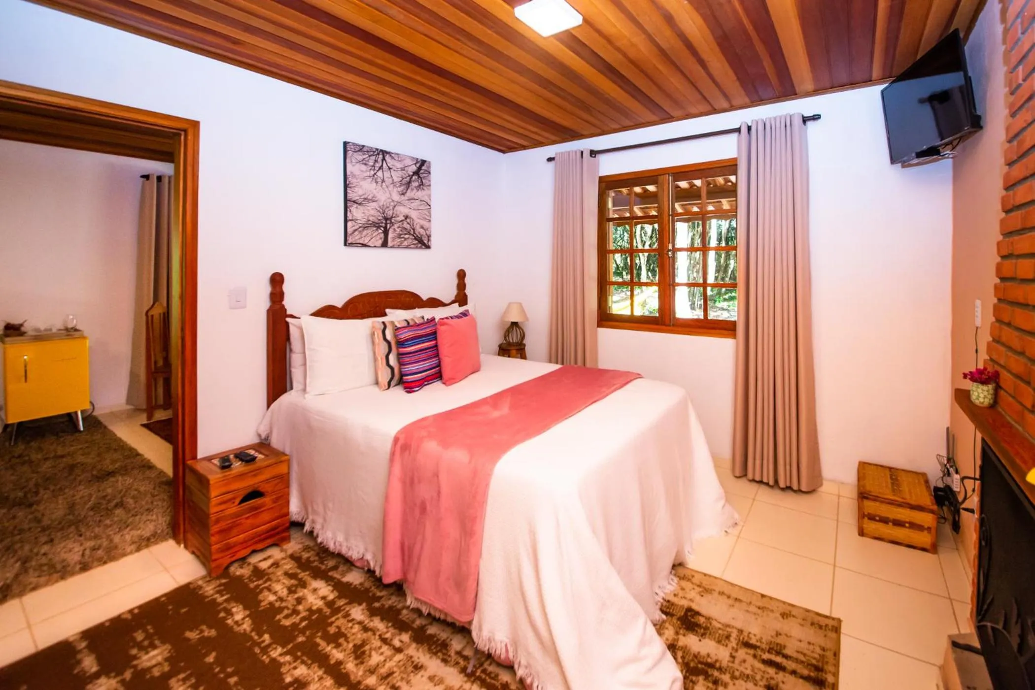 Bed in Chalés Recanto da cachoeira