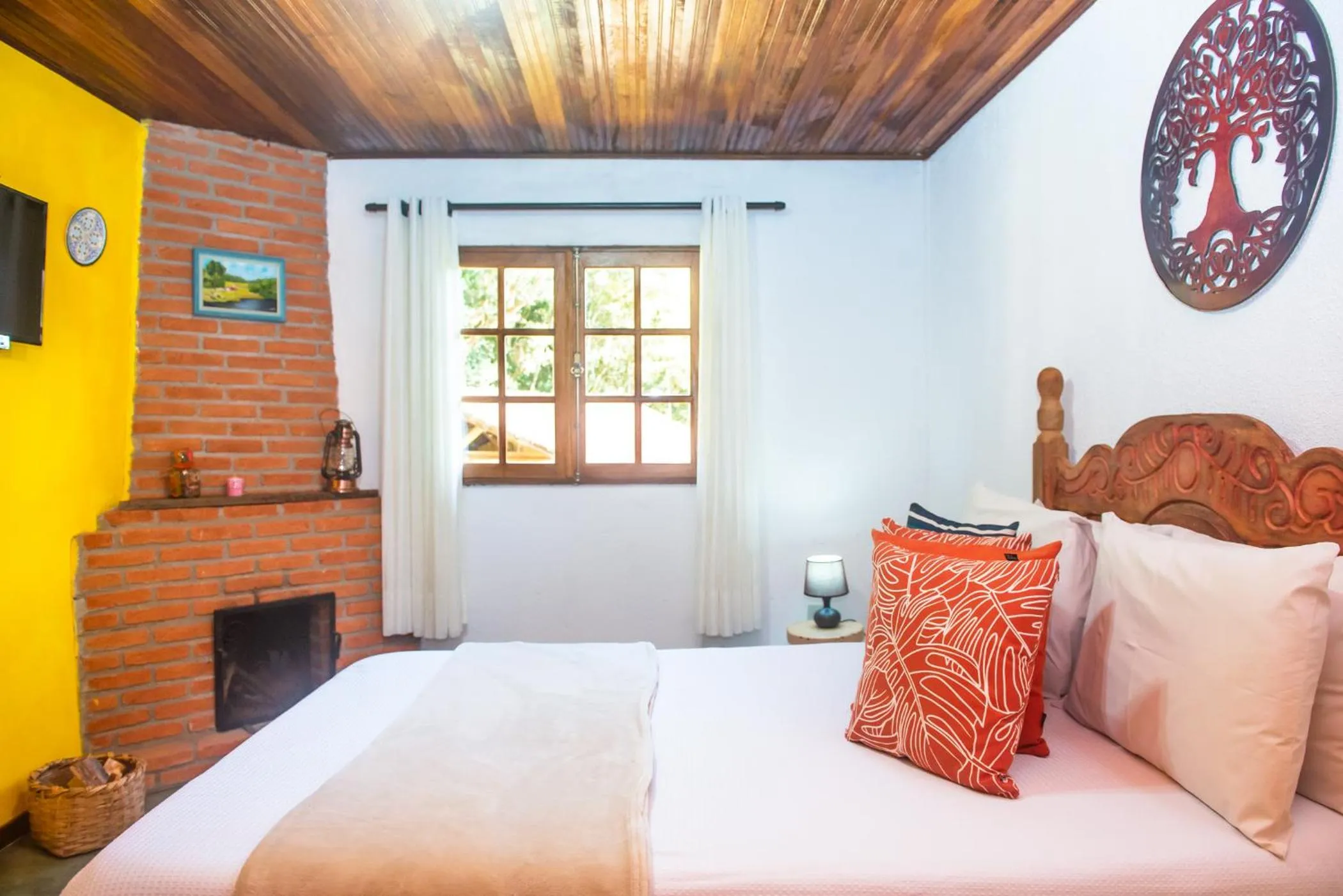 Bed in Chalés Recanto da cachoeira