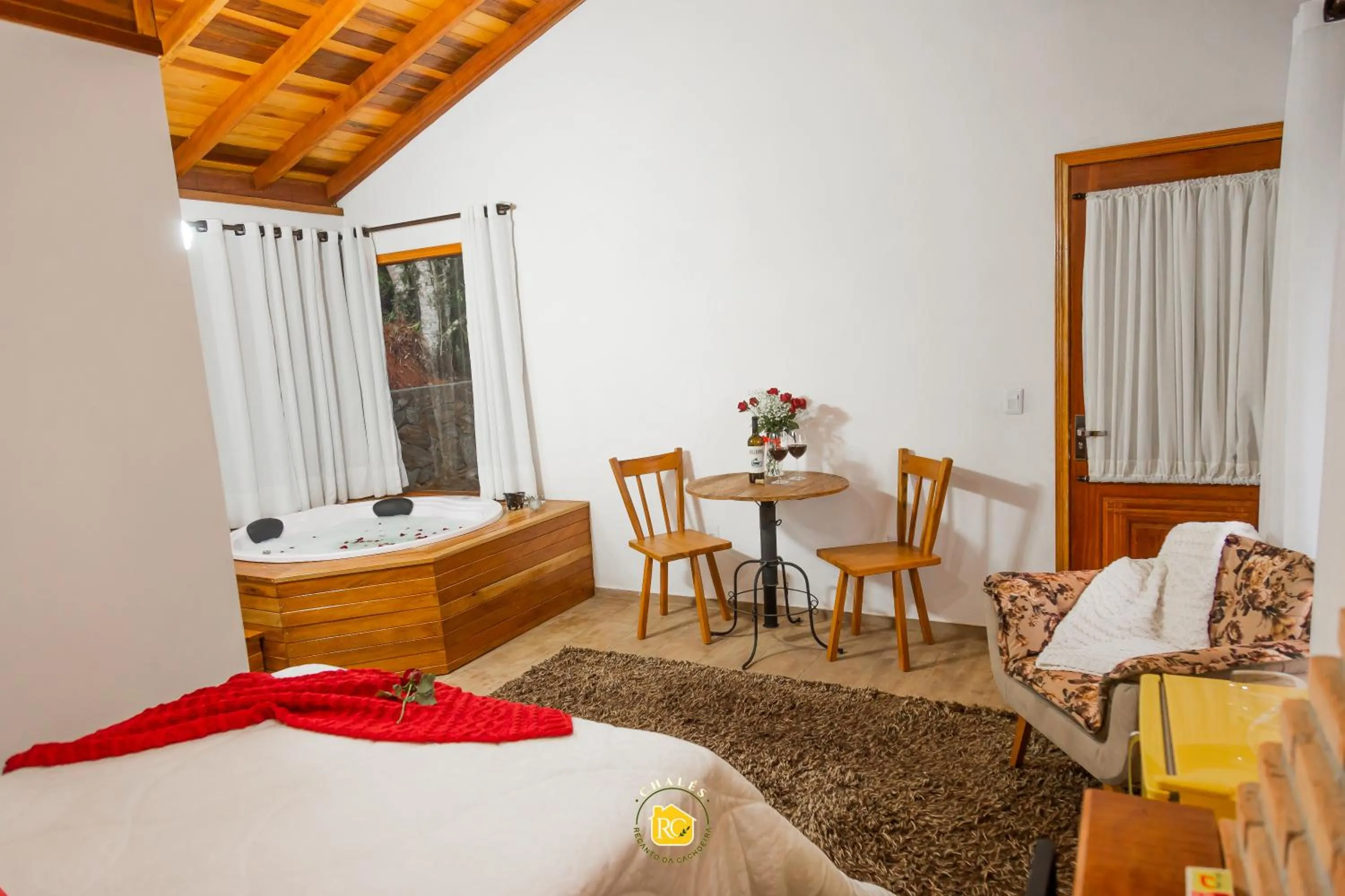 Bed in Chalés Recanto da cachoeira