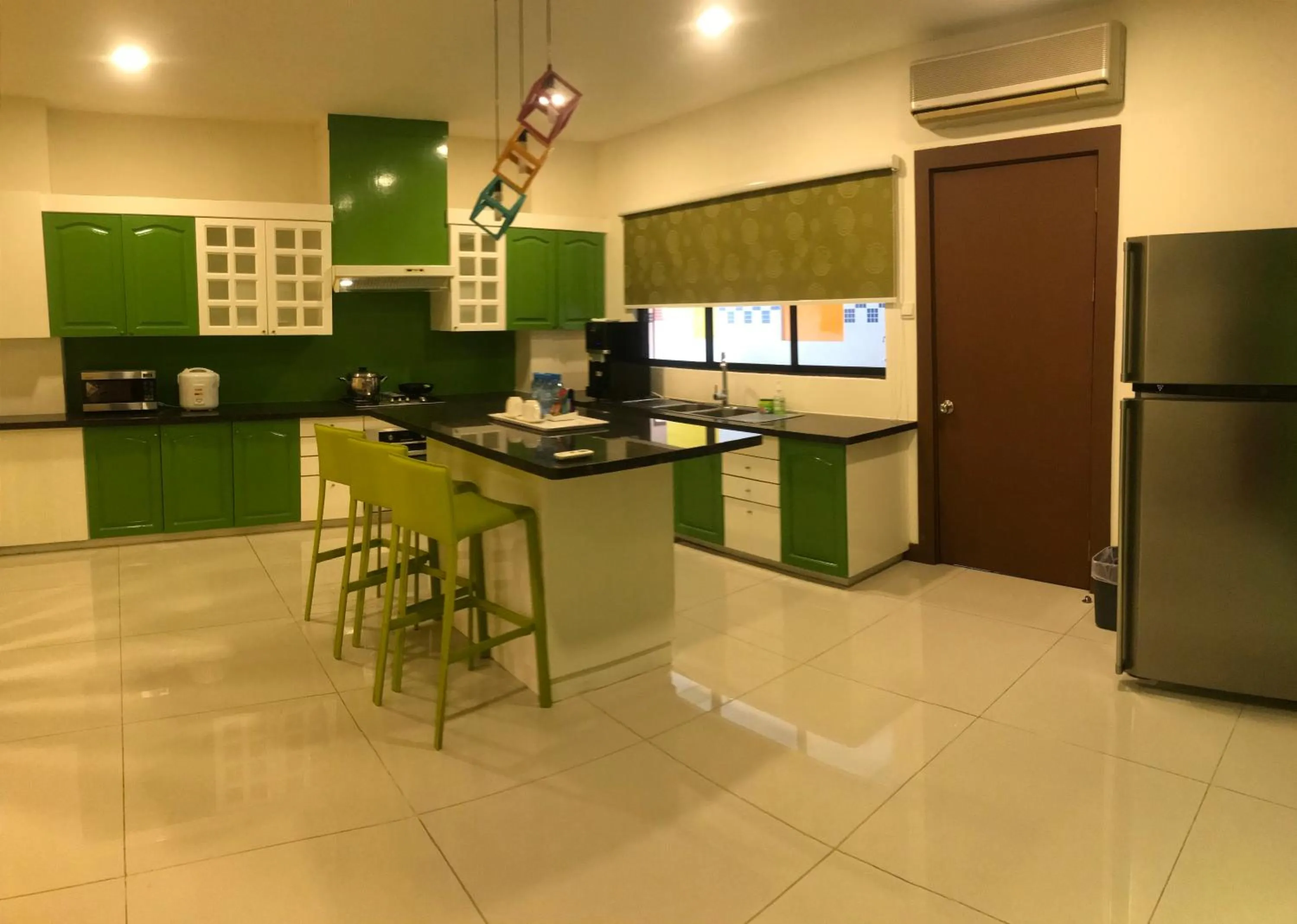 Kitchen or kitchenette in Rimbun Suites & Residences