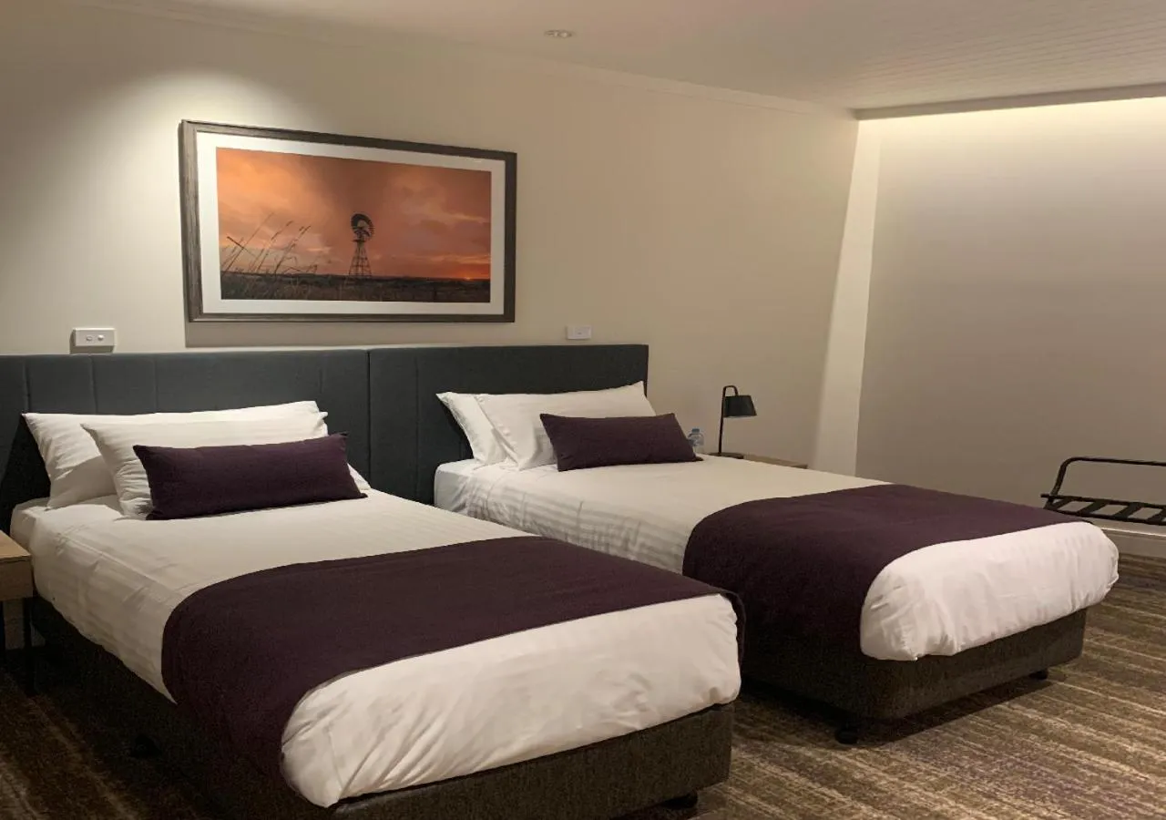 Bed in Porter's Plainland Hotel