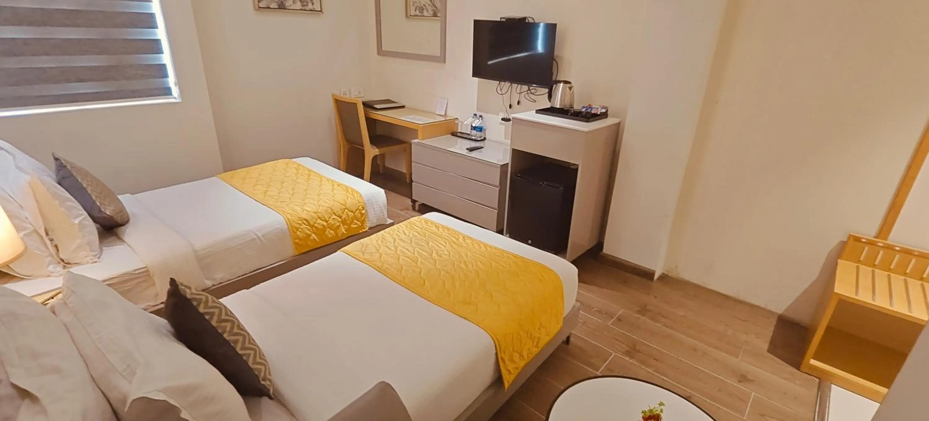 Bed in The Mayberry -A Bergamont Group of Hotels