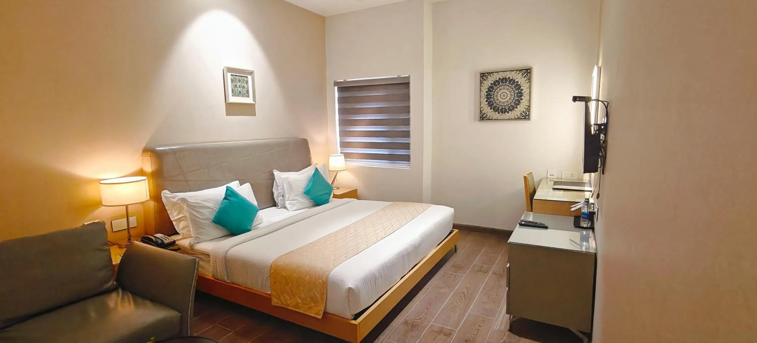 Bed in The Mayberry -A Bergamont Group of Hotels