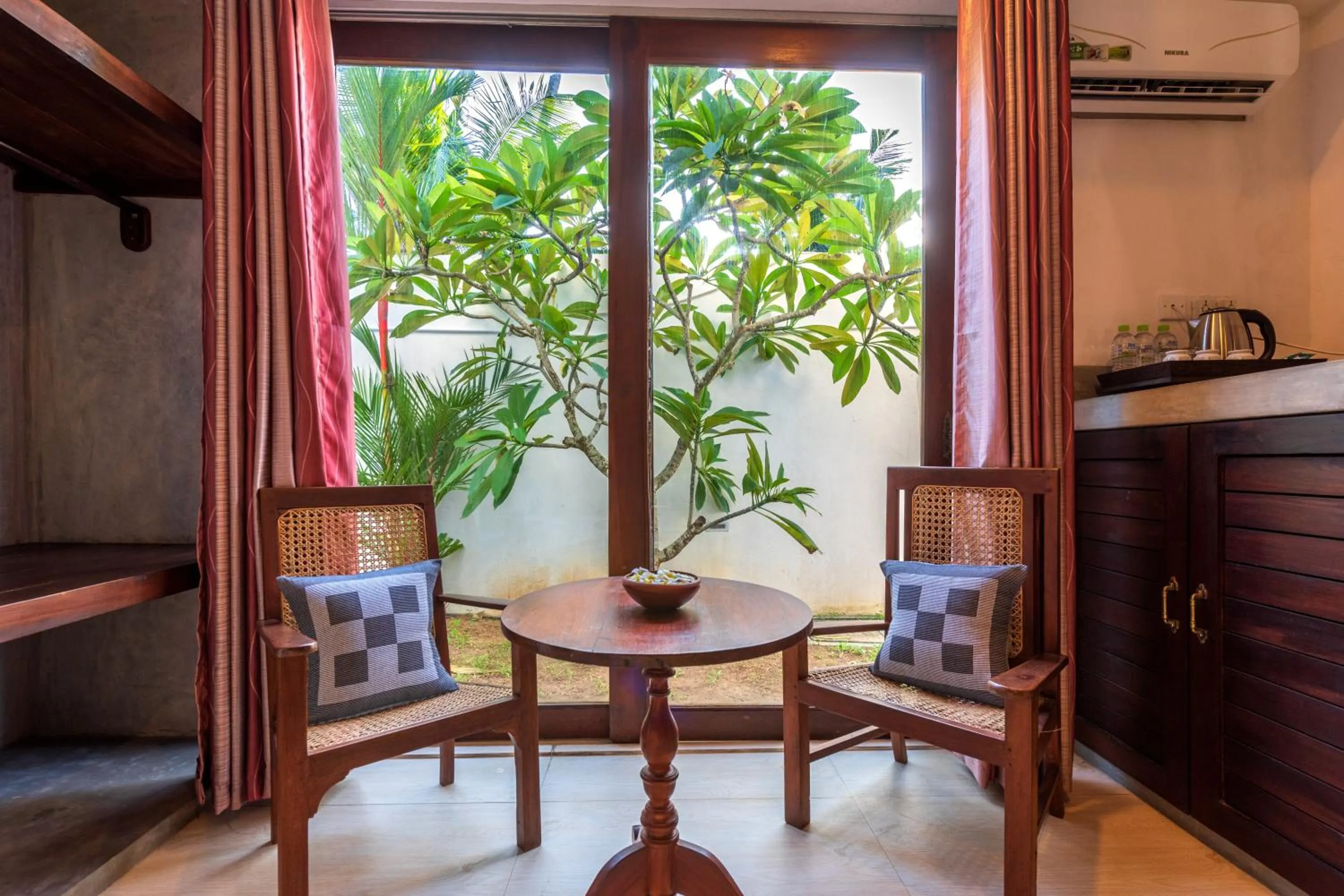 Seating area in Anama by Queens Mount