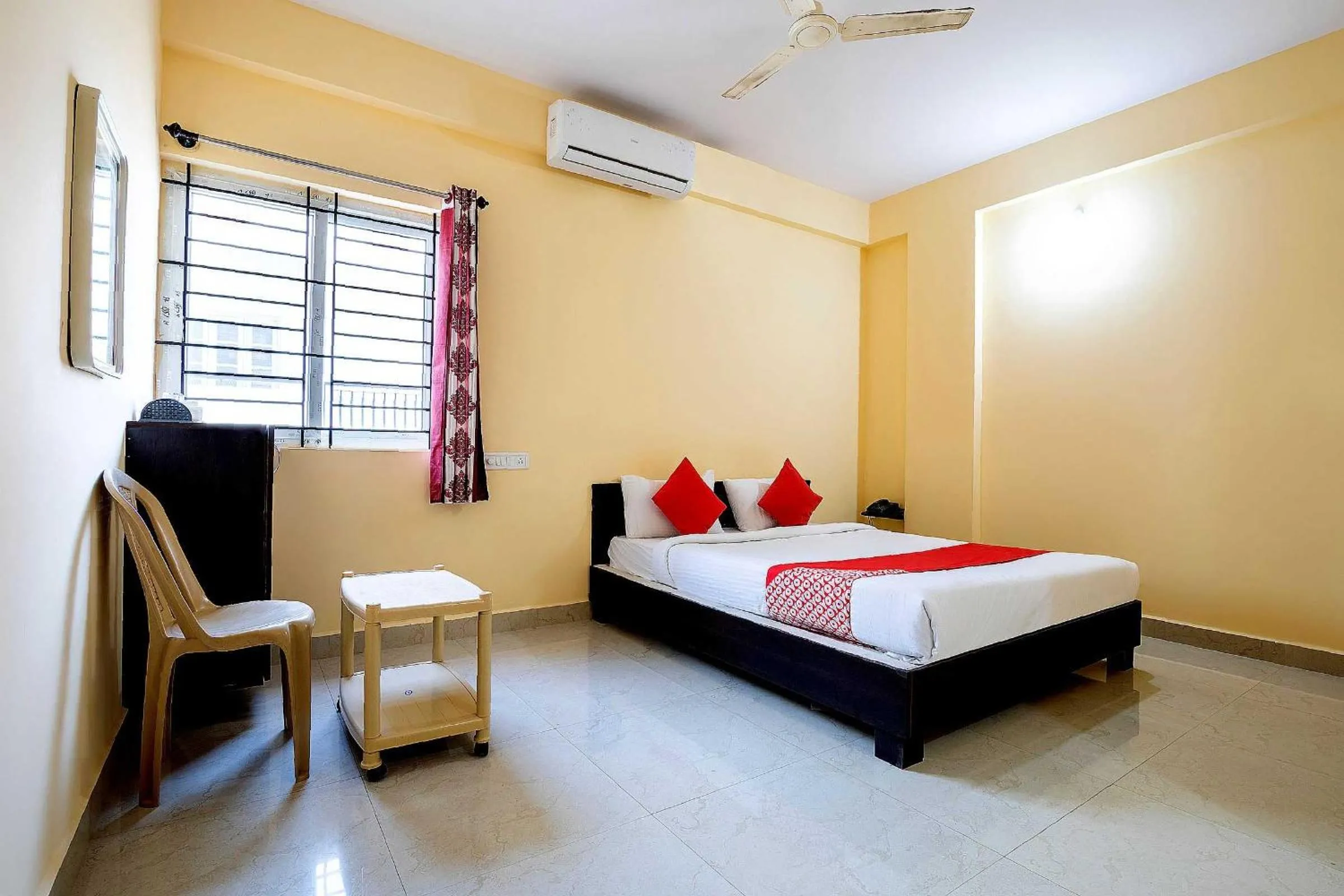 Bedroom in Hotel O Ashraya Comforts