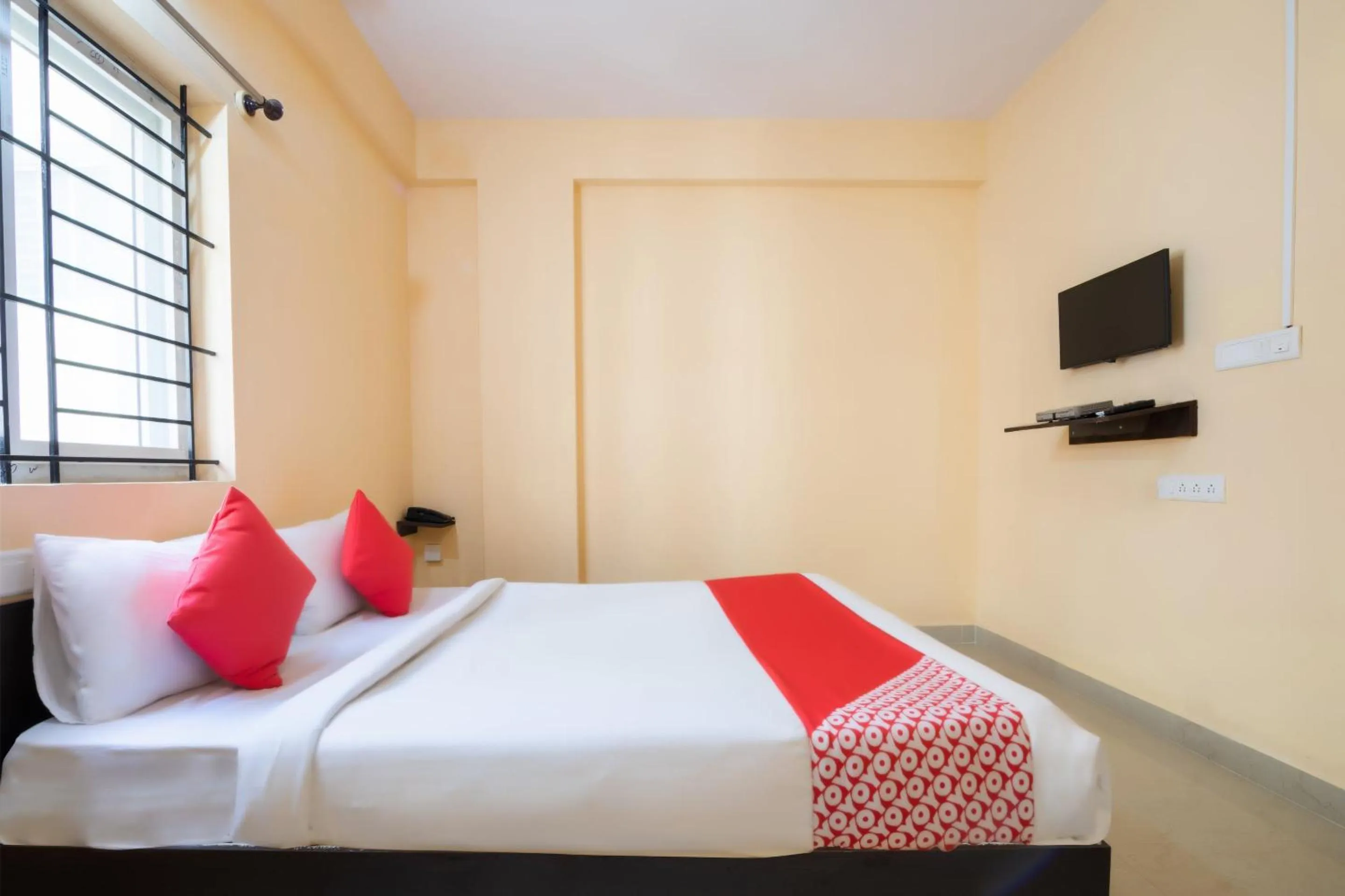 Bedroom in Hotel O Ashraya Comforts