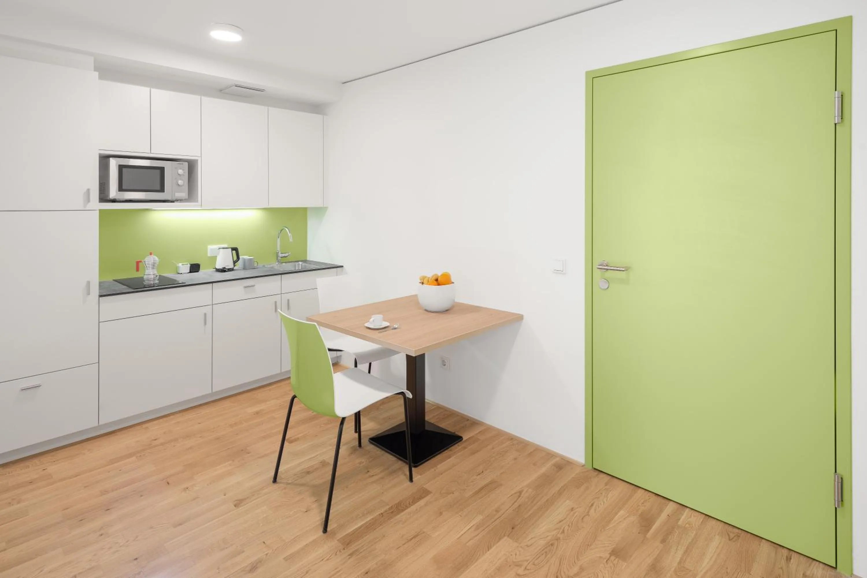 Kitchen or kitchenette in myNext - Hotel Leo