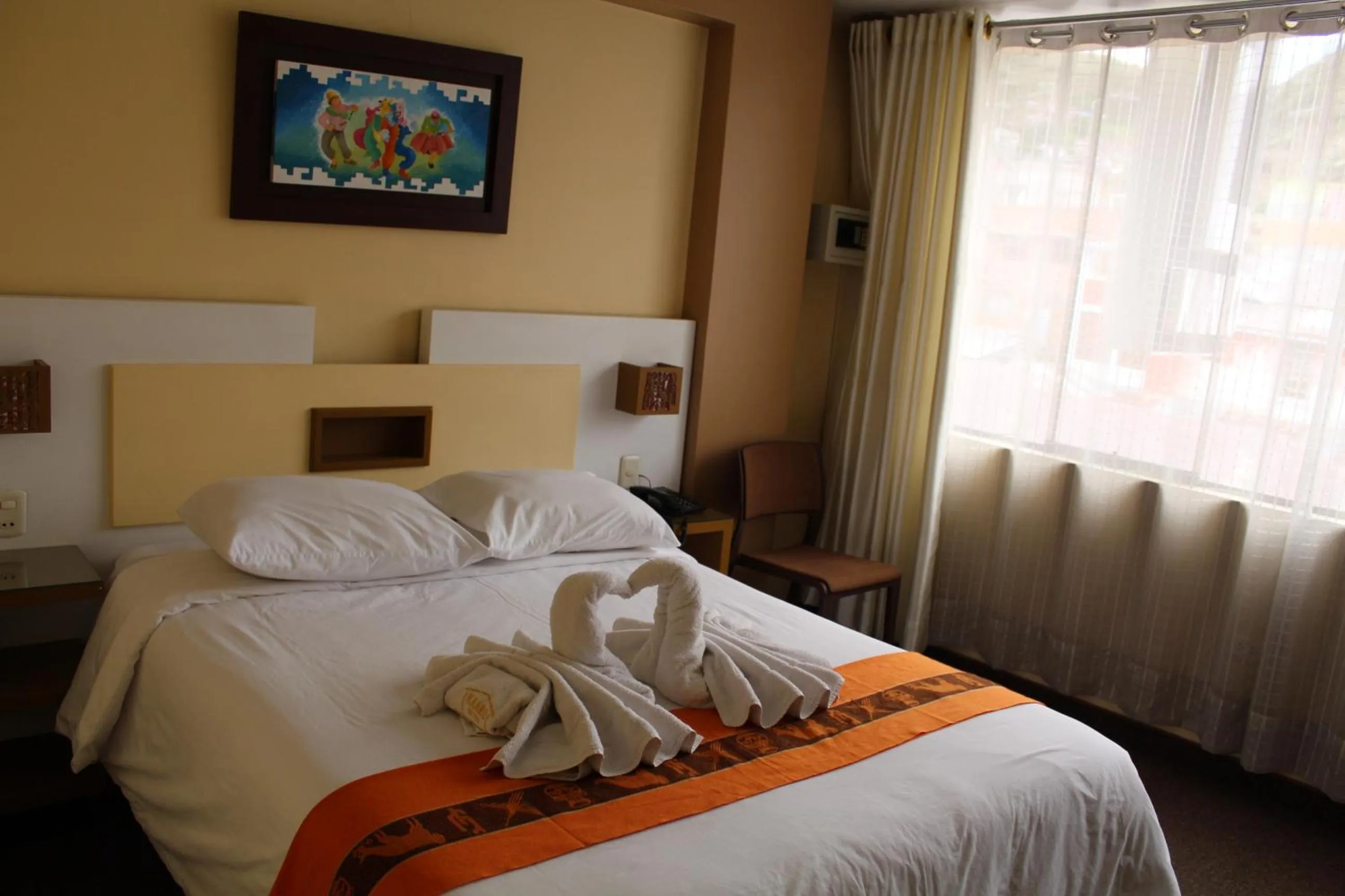 Bed in Kaaro Hotel Puno