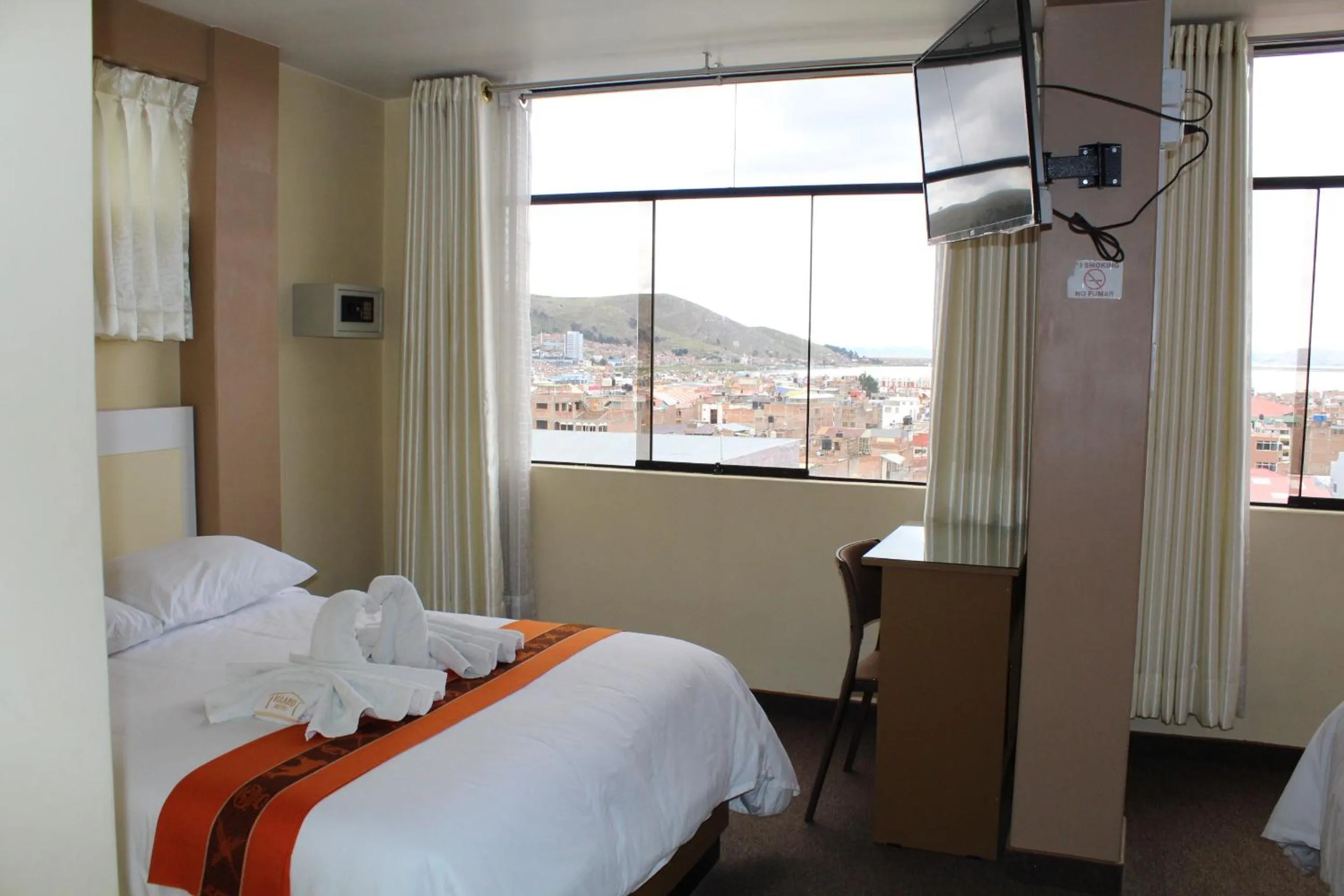 Bed in Kaaro Hotel Puno