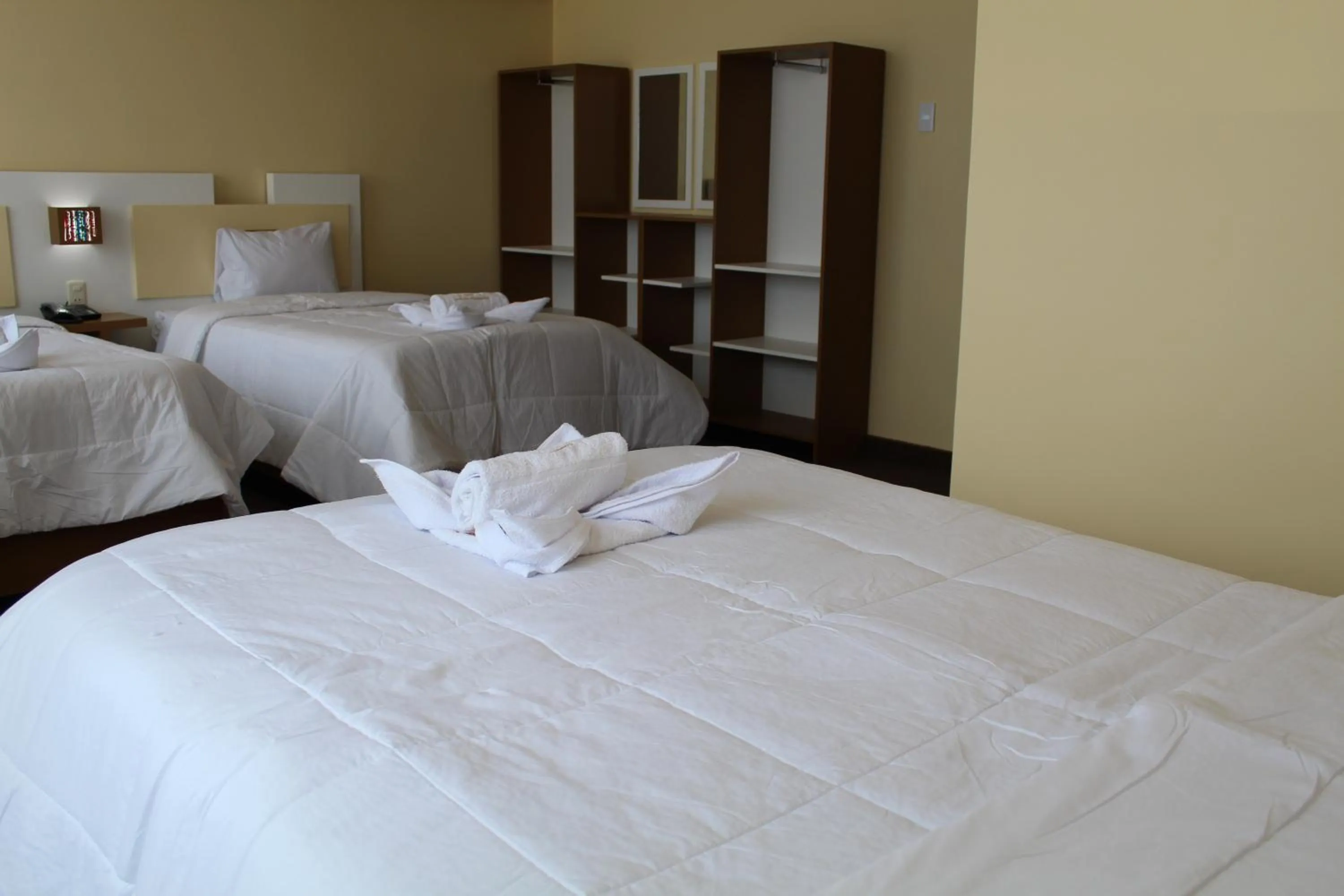 Bed in Kaaro Hotel Puno