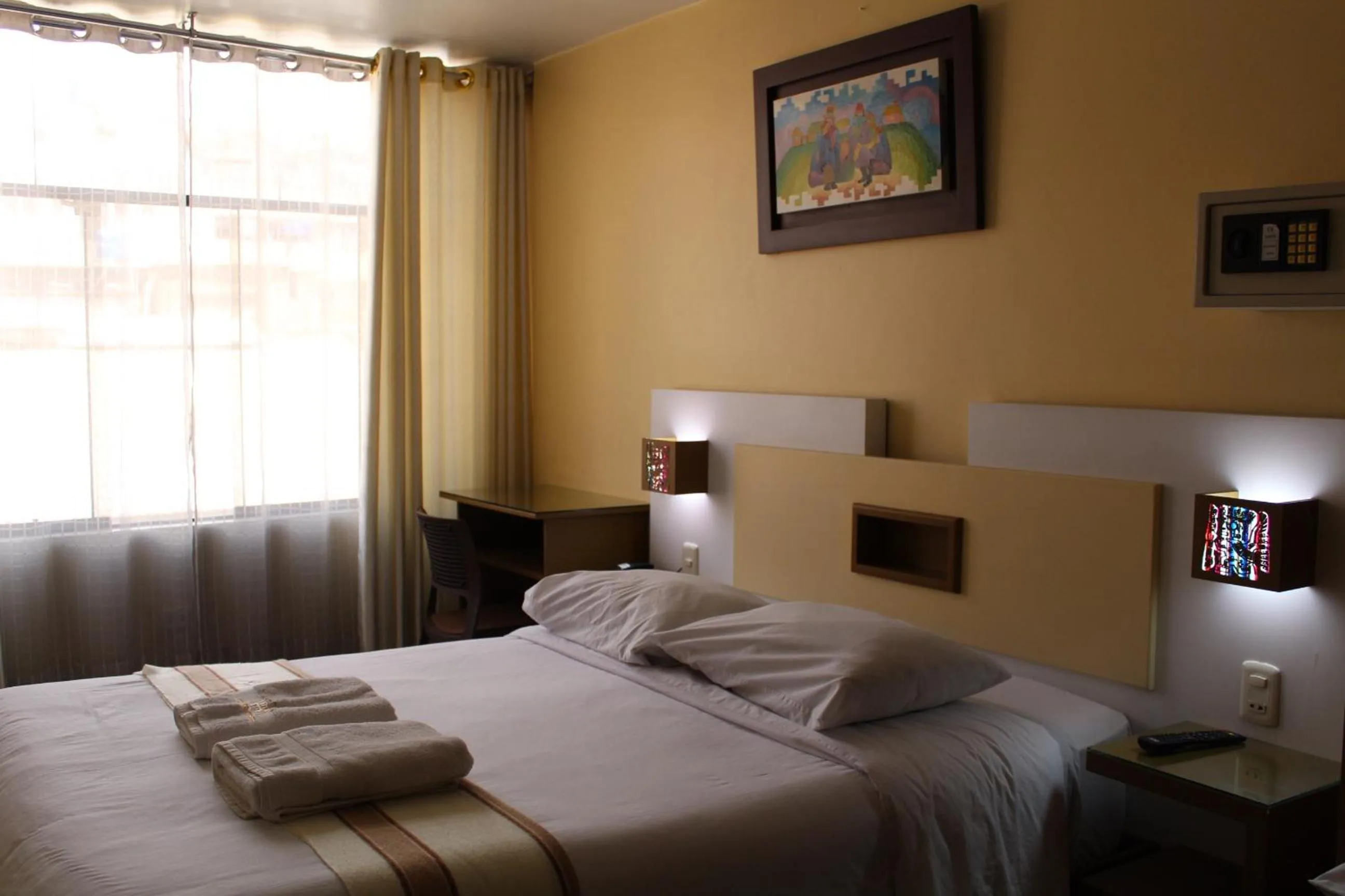 Bed in Kaaro Hotel Puno