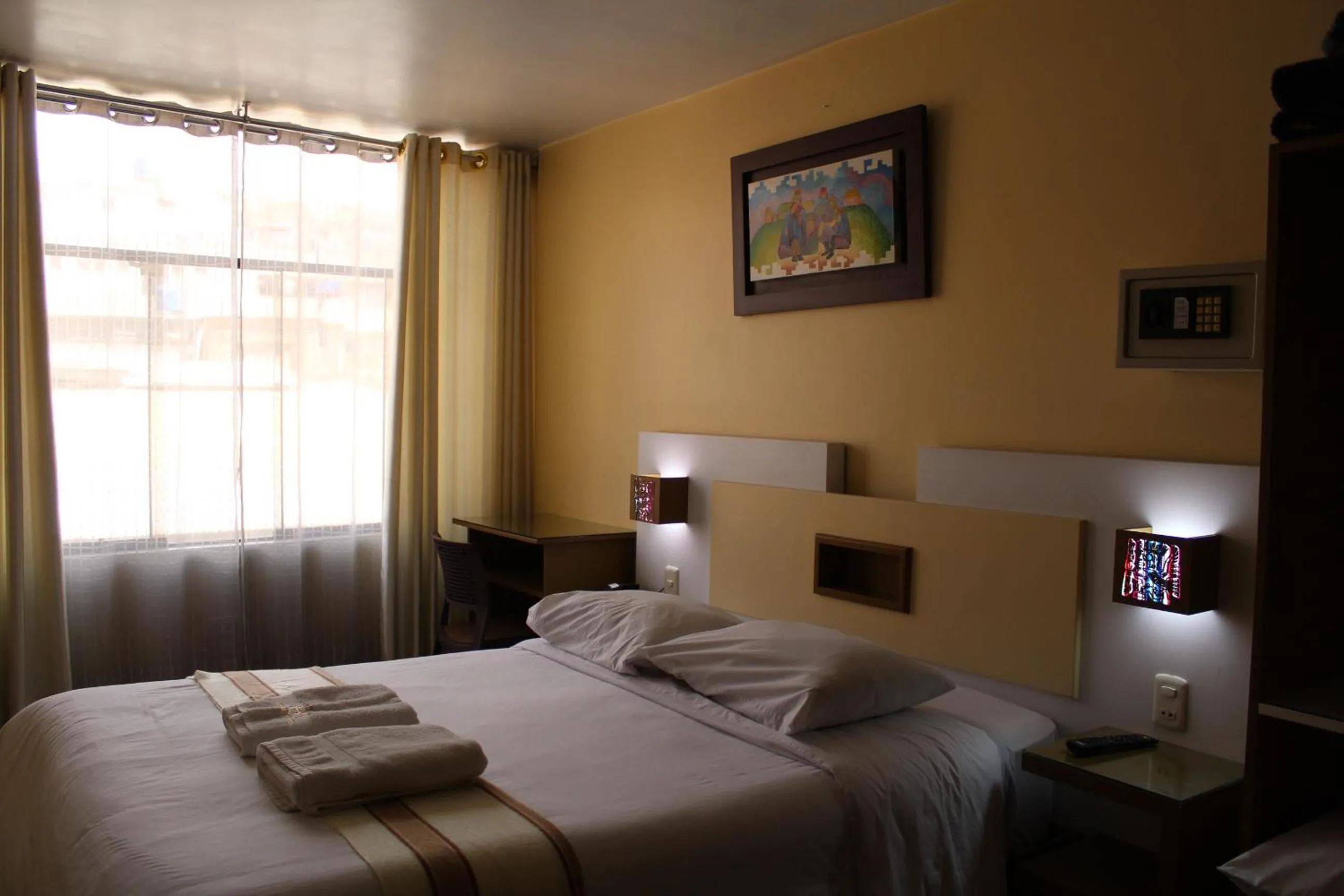 Bed in Kaaro Hotel Puno