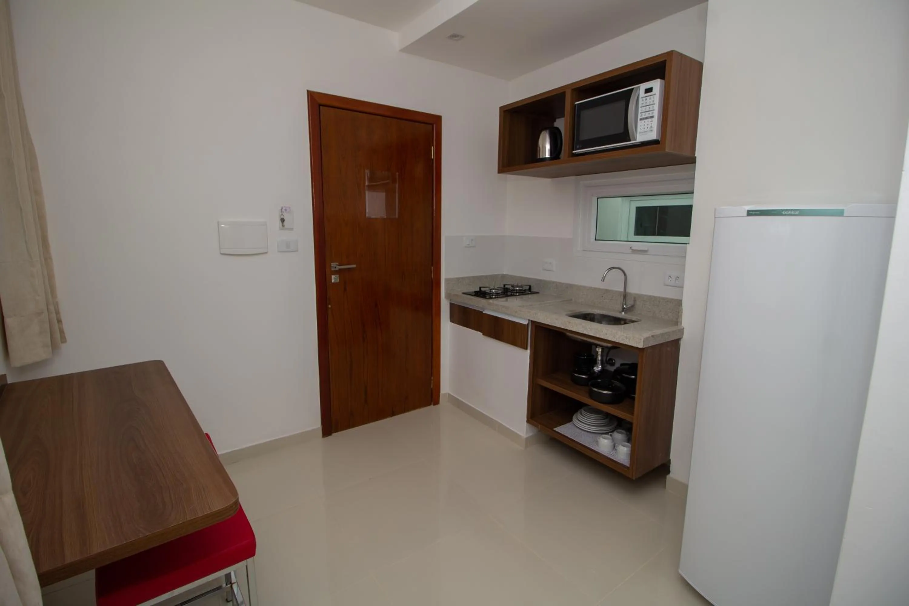 Kitchen or kitchenette in Apart-Hotel Bella Vida Suítes e Apartamentos