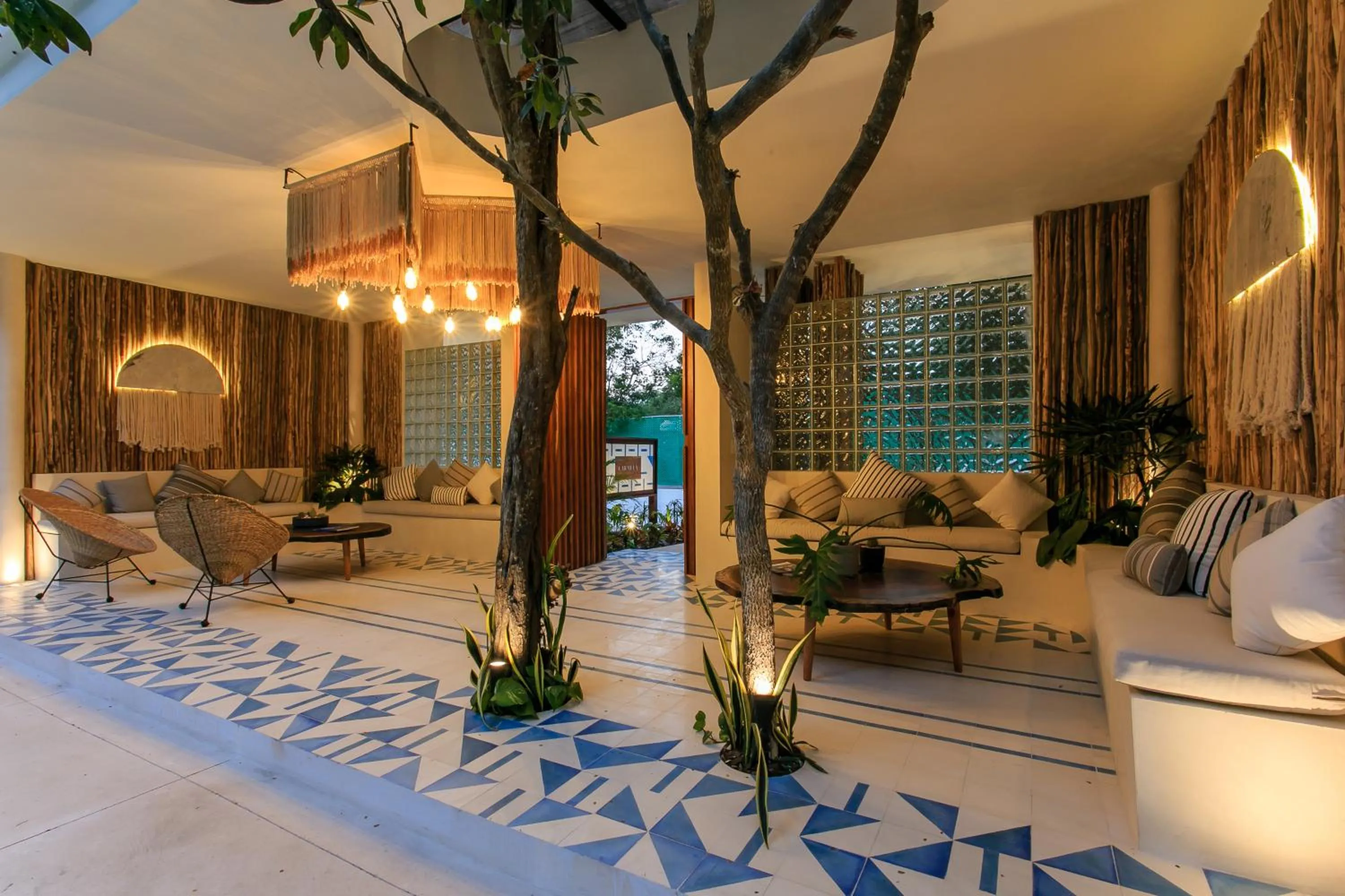 Lobby or reception in Charming Nature-Inspired Condos with Sultry Surroundings by Stella Rentals