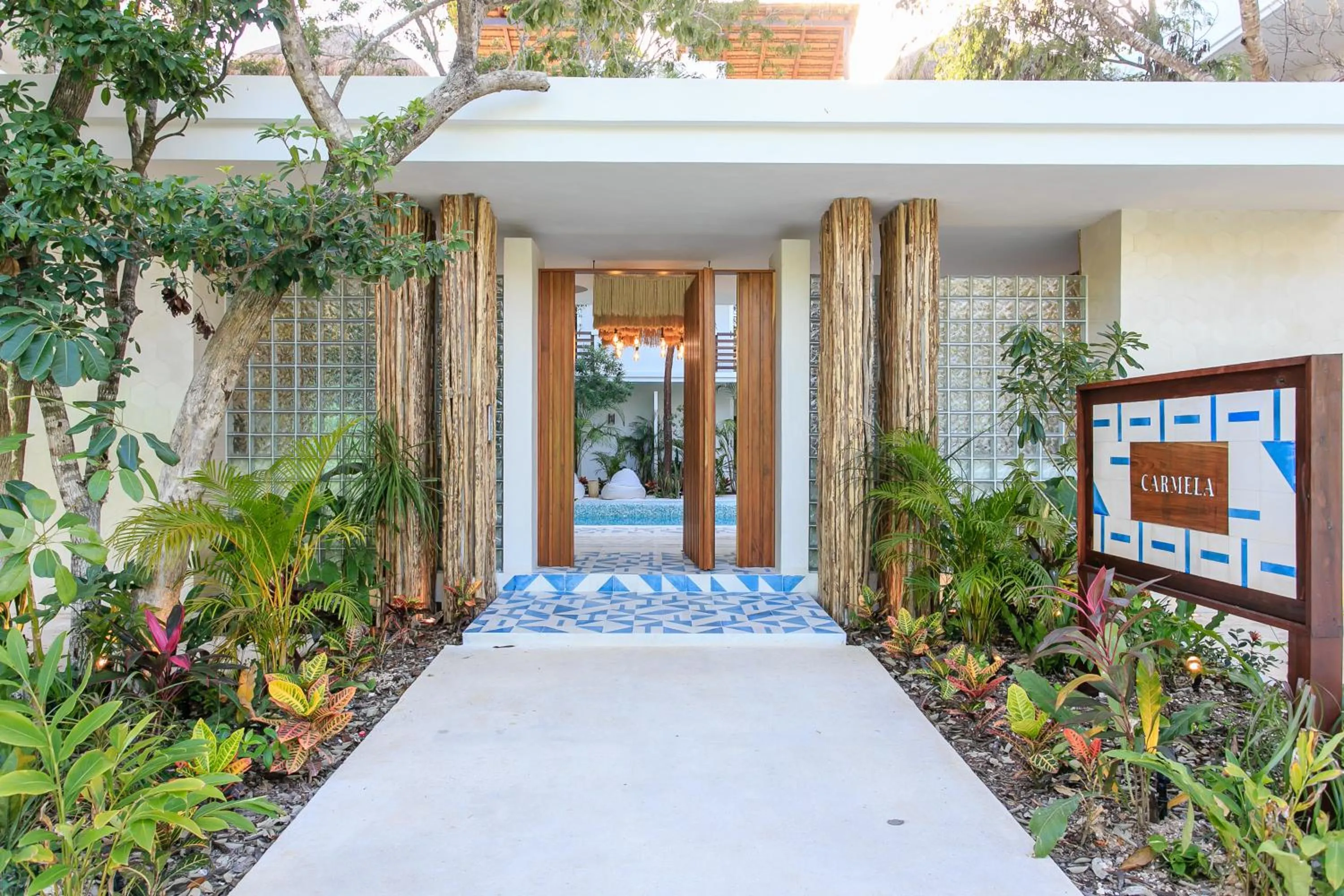 Facade/entrance in Charming Nature-Inspired Condos with Sultry Surroundings by Stella Rentals