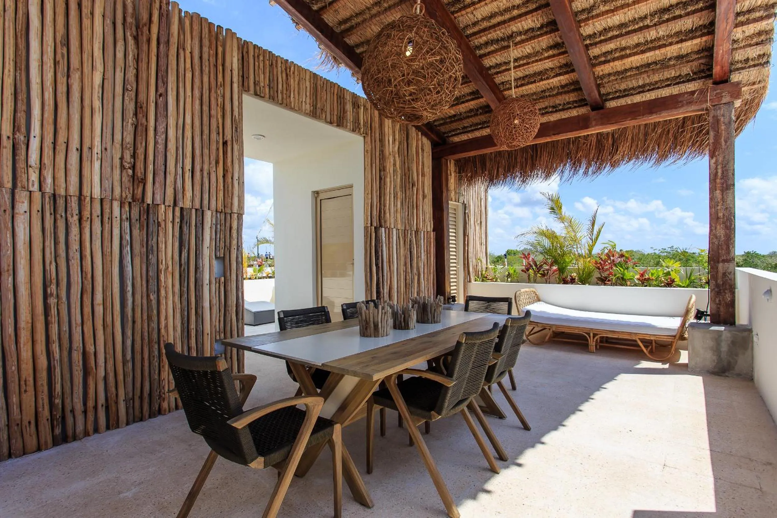 Balcony/Terrace in Charming Nature-Inspired Condos with Sultry Surroundings by Stella Rentals