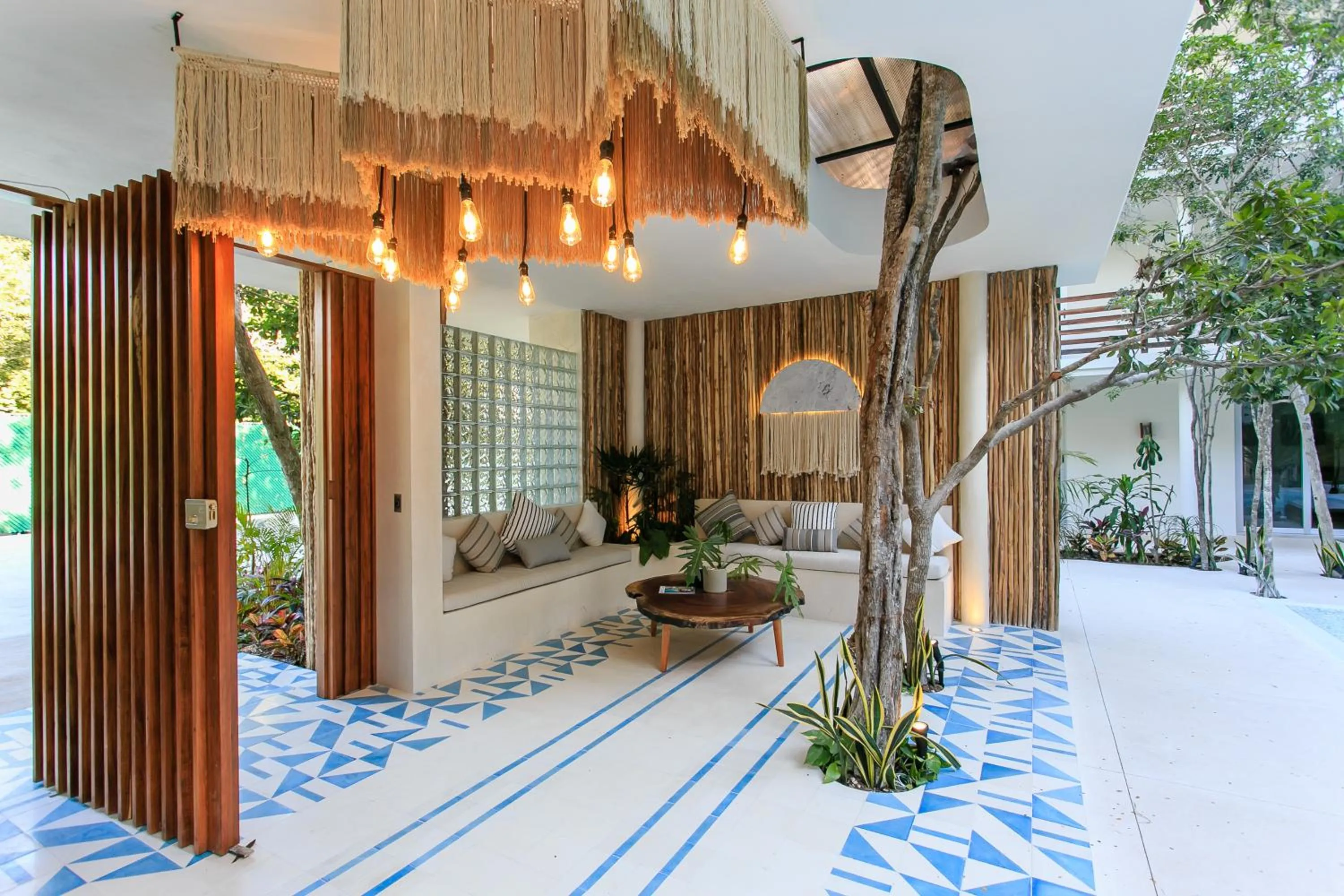 Lobby or reception in Charming Nature-Inspired Condos with Sultry Surroundings by Stella Rentals