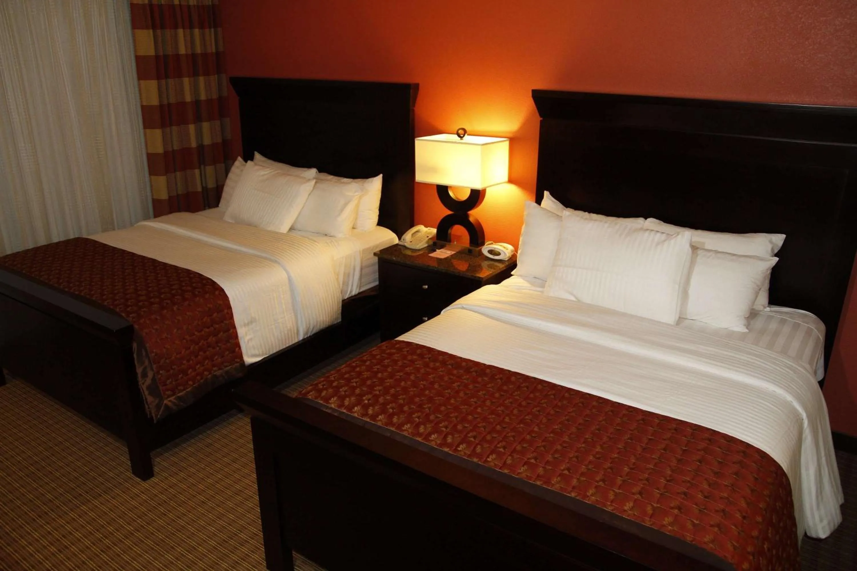 Photo of the whole room, Bed in Ramada by Wyndham Viscount Suites Tucson East
