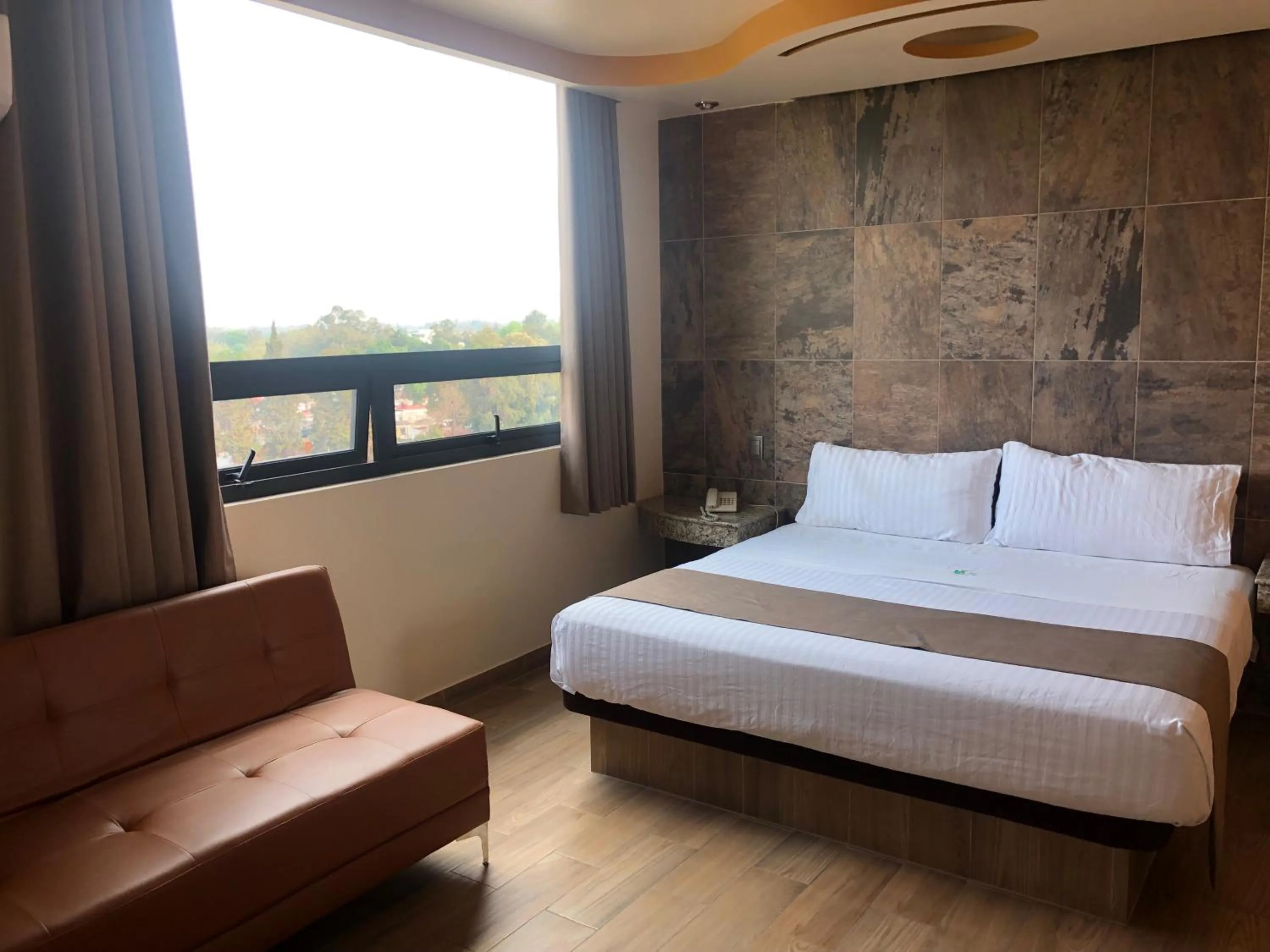 Bed in Hotel Jard Inn Adult Only