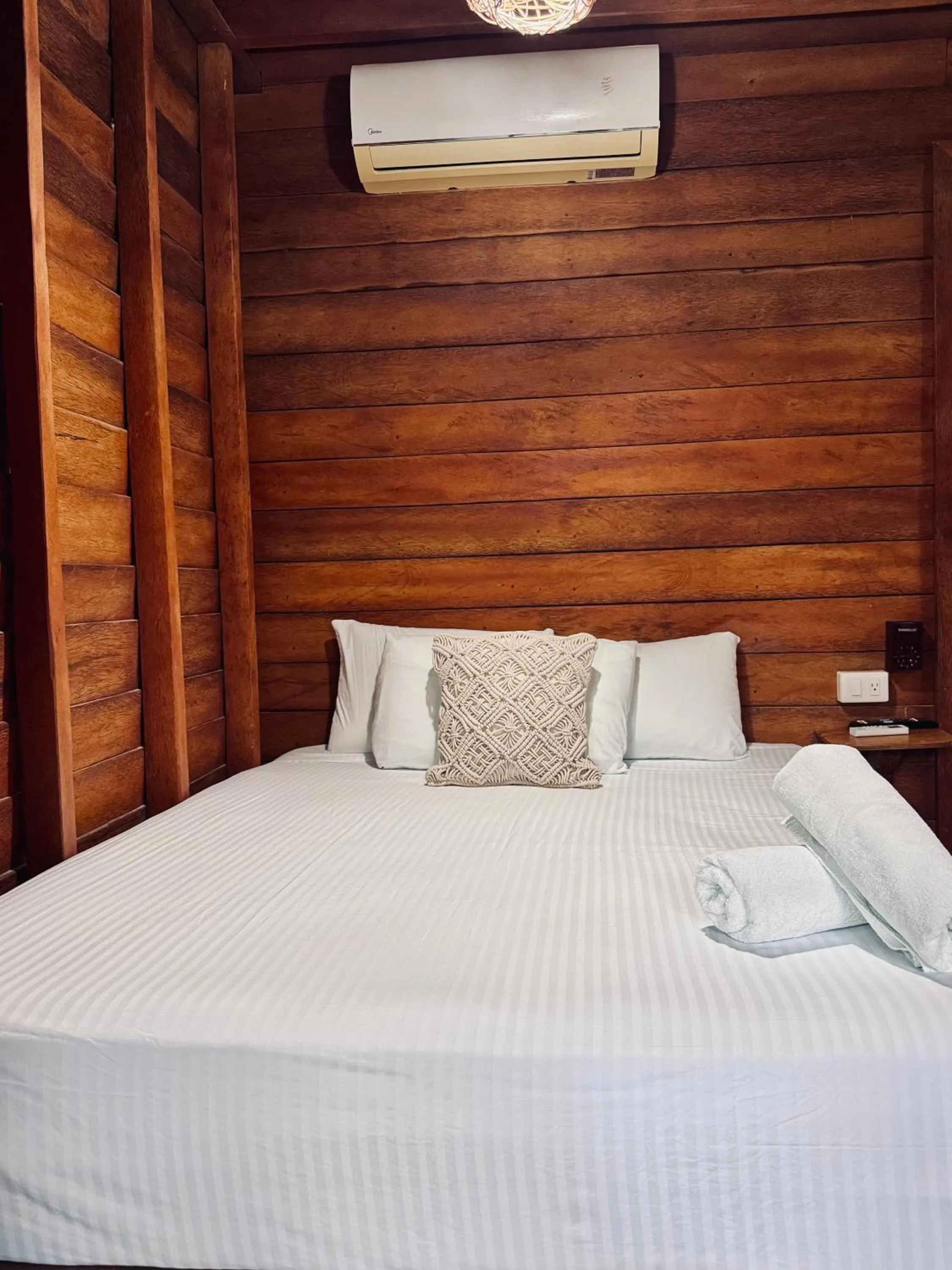 Bed in Hotelito Villas Holbox - Self Check In