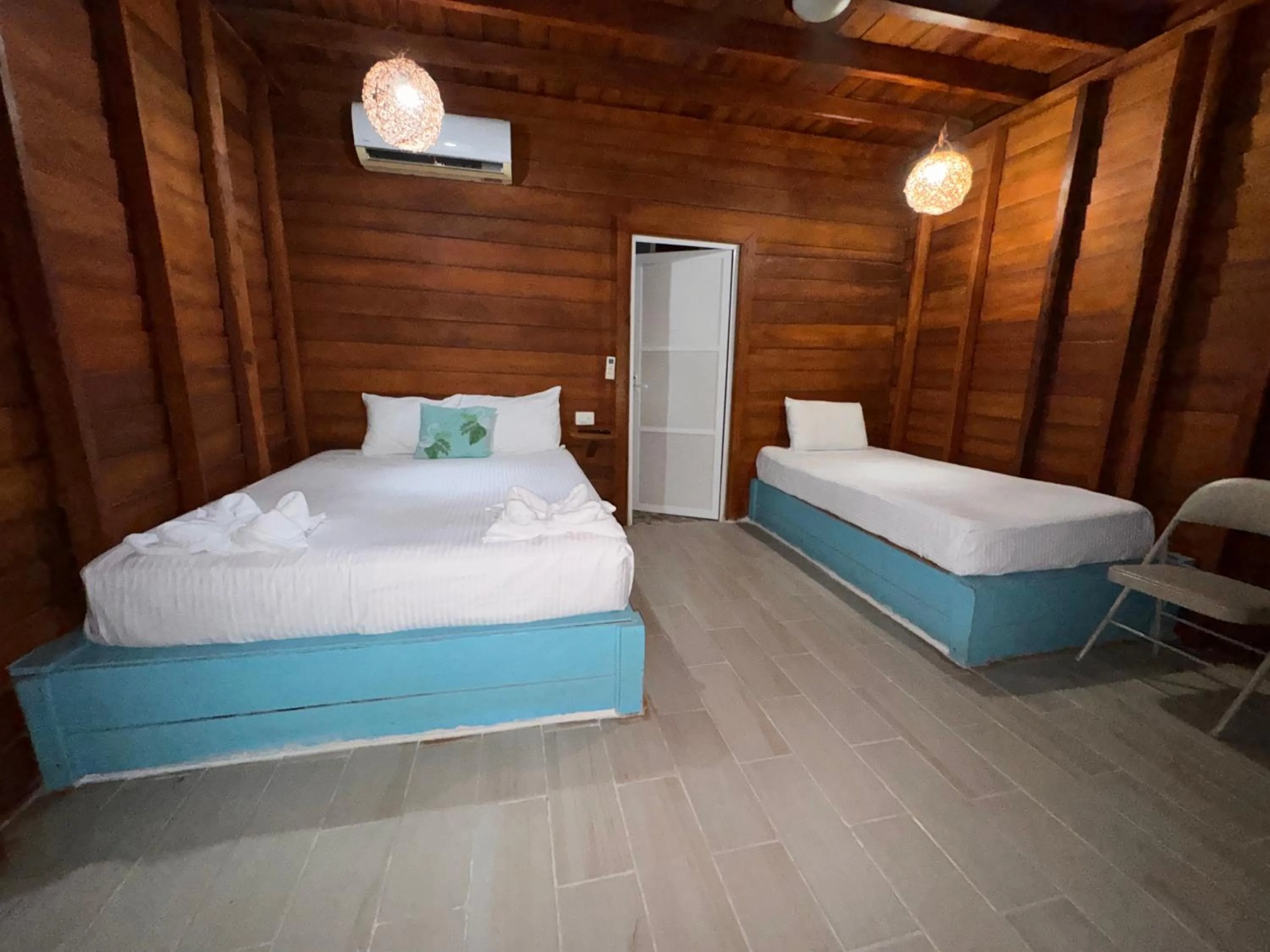 Bed in Hotelito Villas Holbox