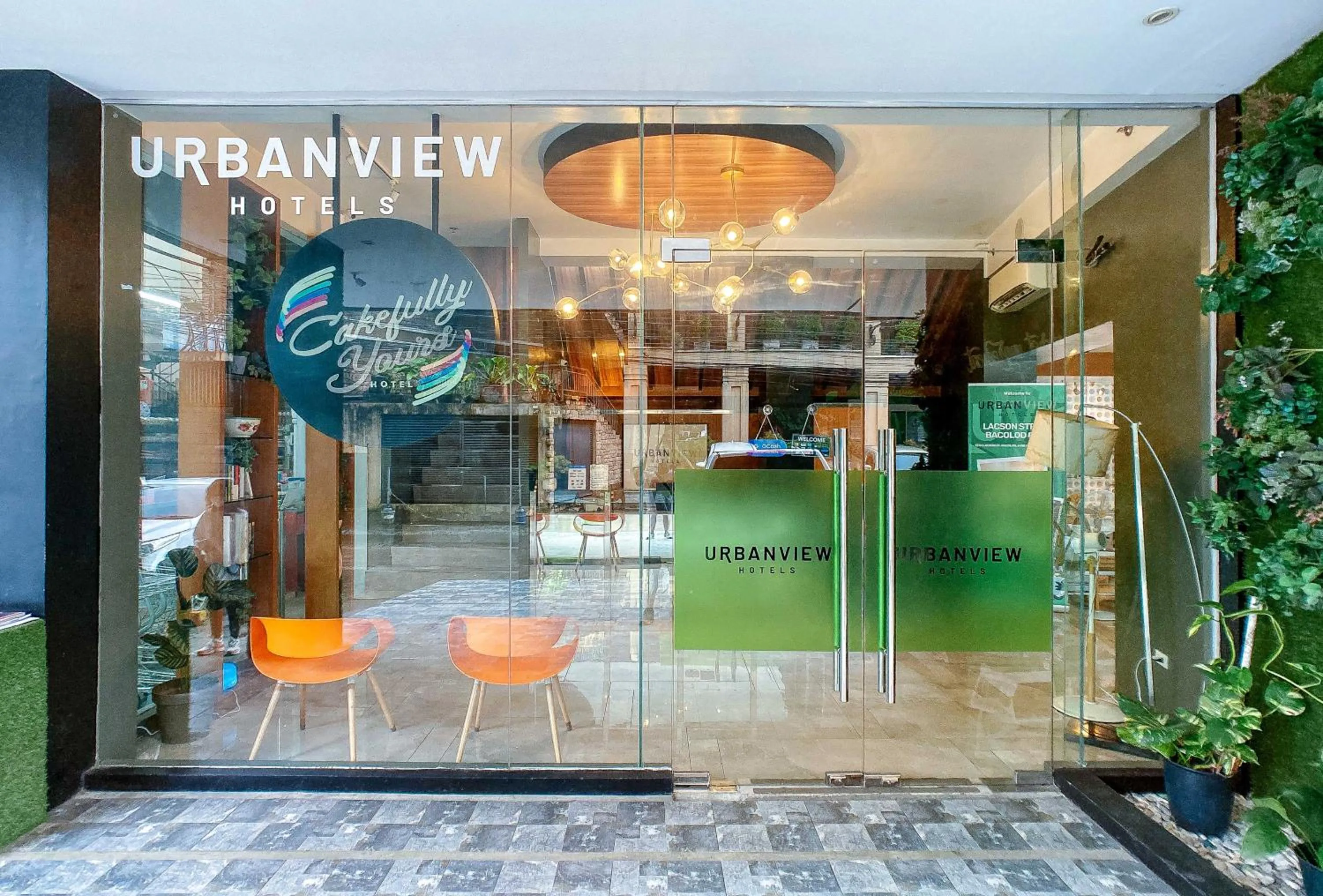 Facade/entrance in UrbanView at Lacson Street Bacolod City by RedDoorz