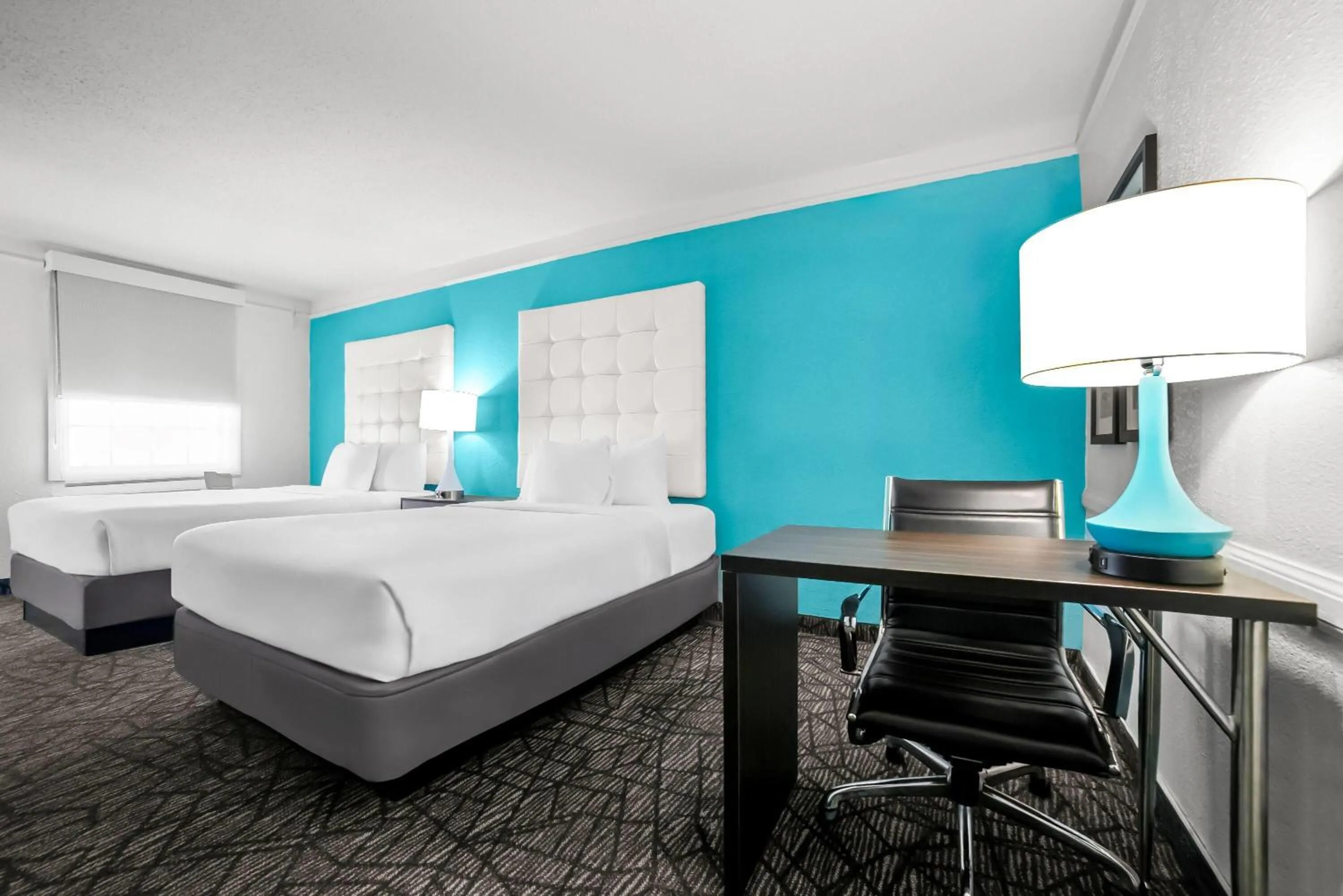 Bed in Howard Johnson by Wyndham Columbus Fort Moore