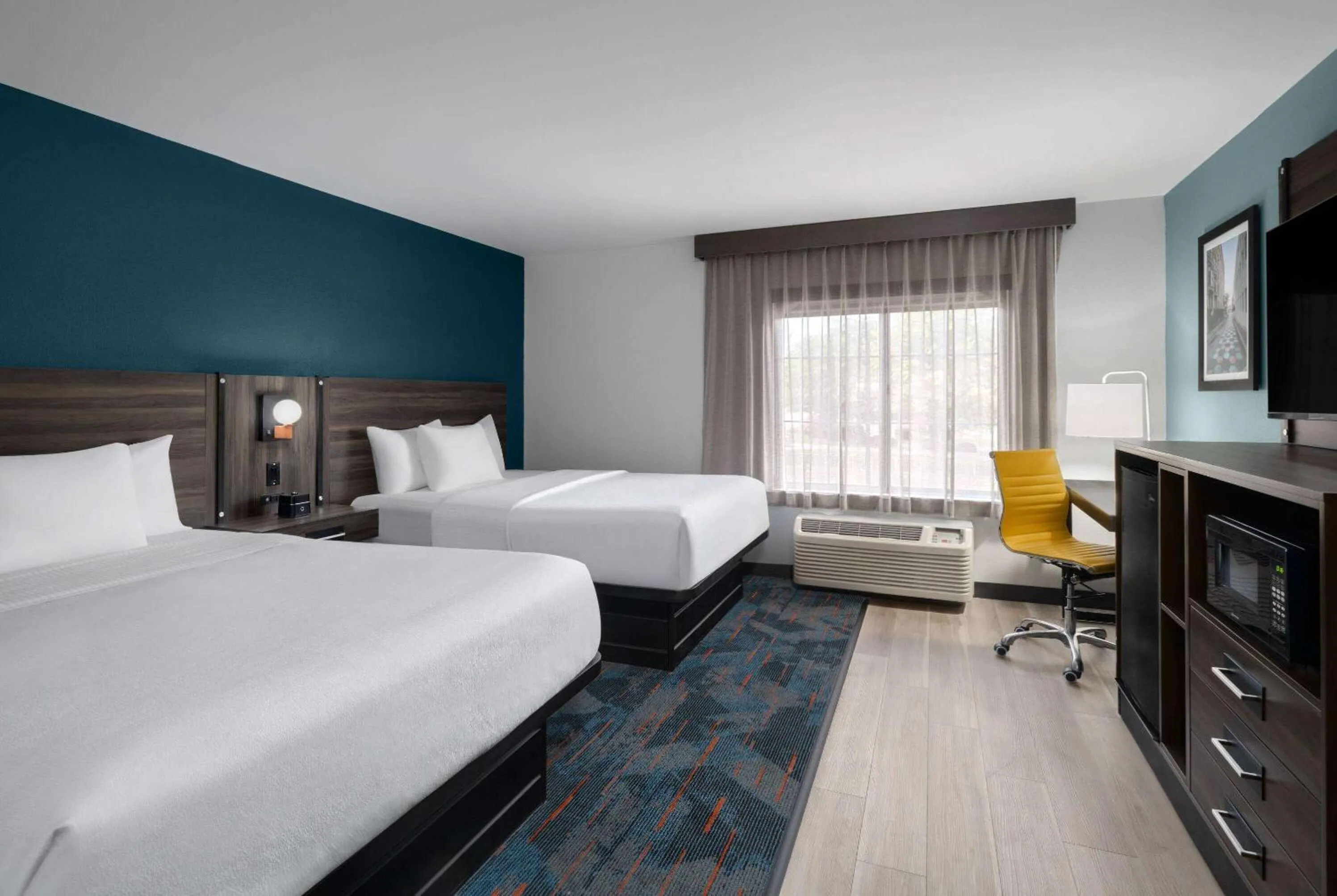 Photo of the whole room, Bed in La Quinta by Wyndham Greensboro NC