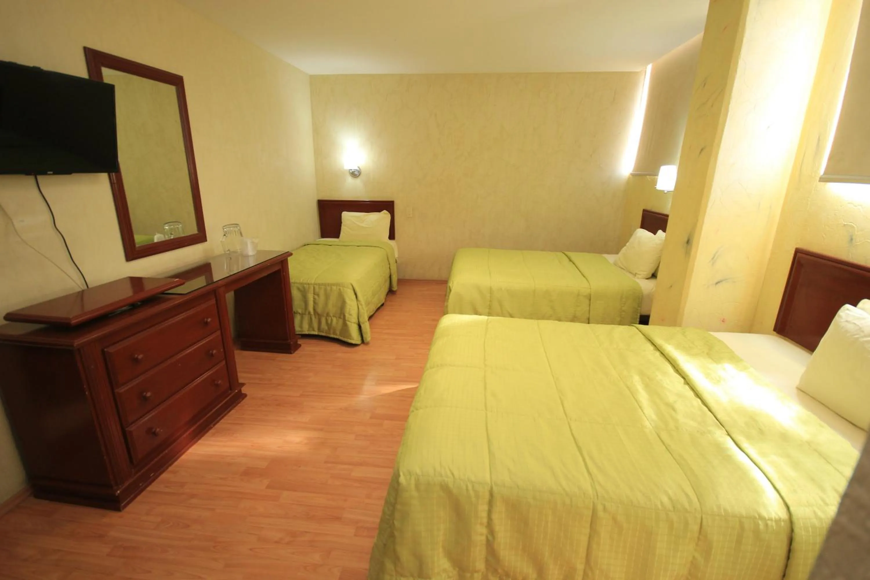 Bed in Hotel Enterprise Inn Plaza