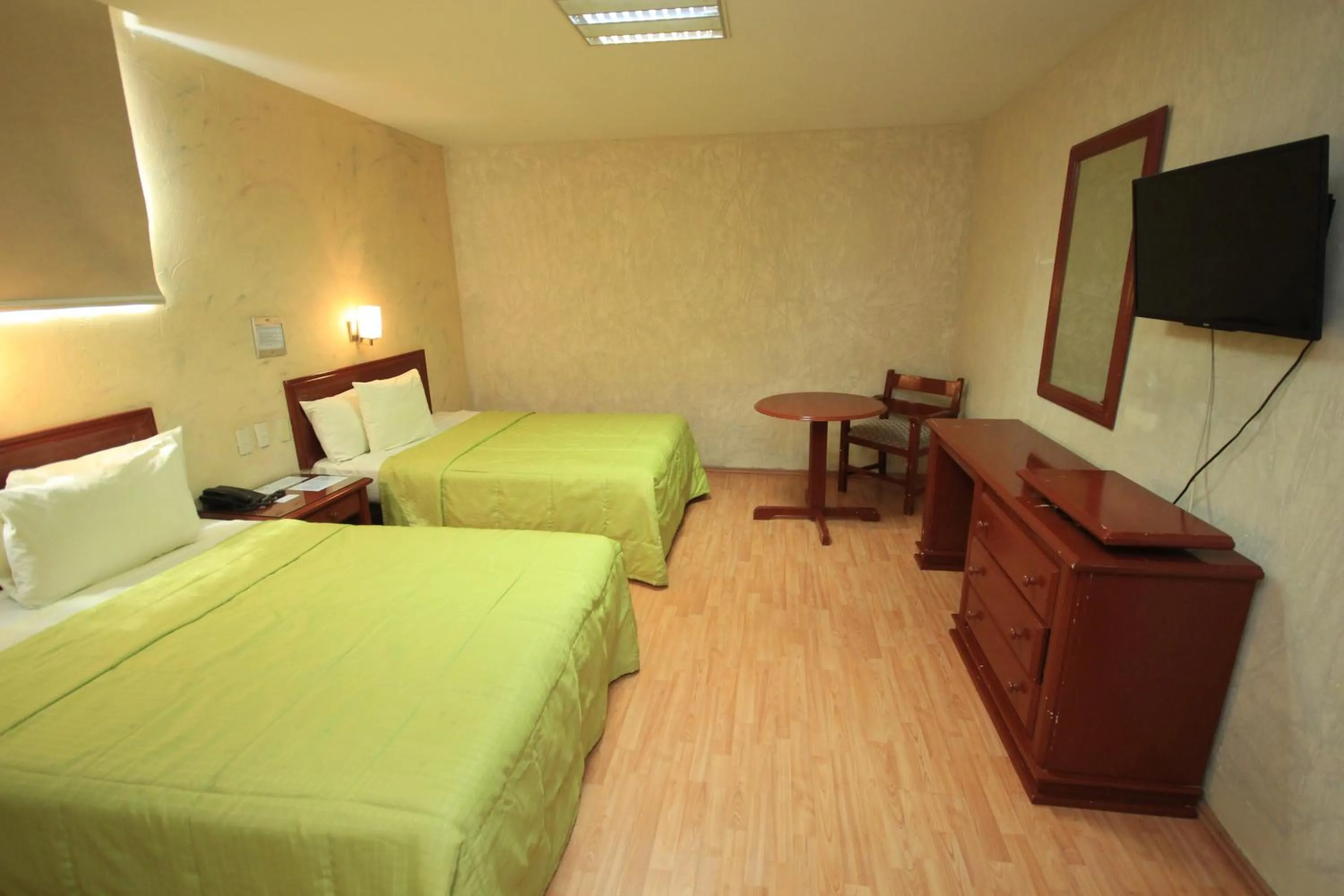 Bed in Hotel Enterprise Inn Plaza